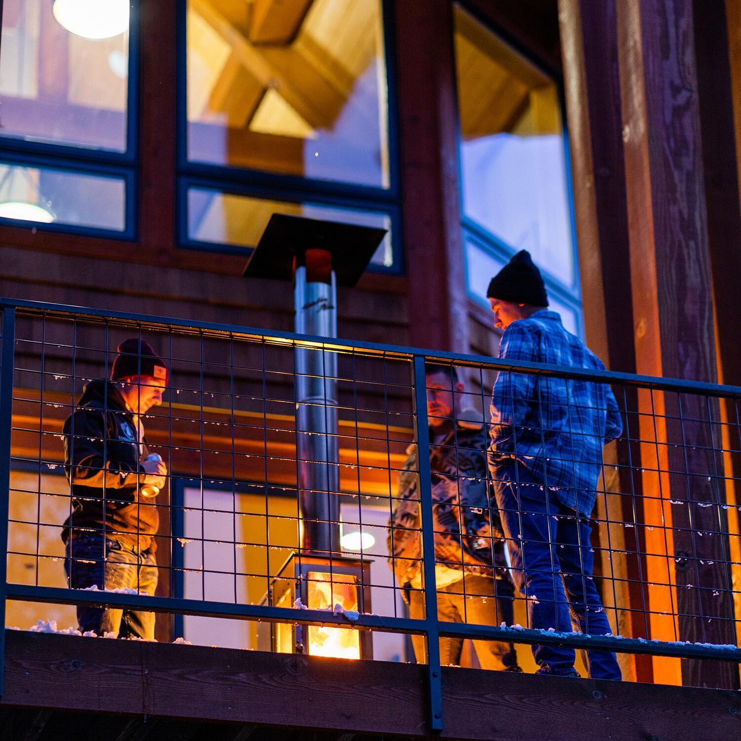 Timber Stoves Revere 22-in 90,000 BTU Pellet Freestanding Patio Heater - Stainless Steel - WPPHRSS1.0 - On Balcony - Lifestyle thumbnail