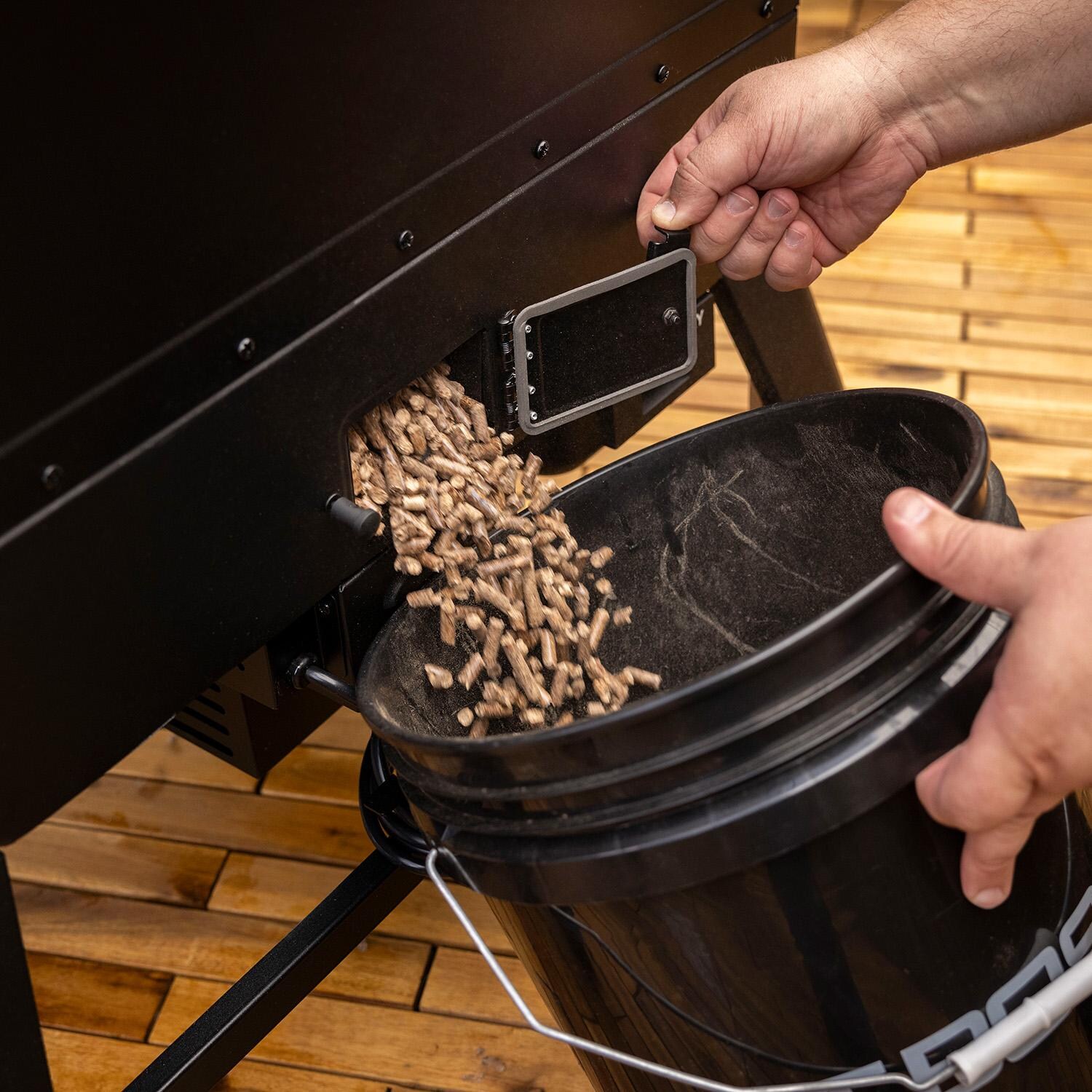 Pit Boss 11115 Navigator 6-Series Vertical Pellet Smoker - Emptying Hopper - Detail thumbnail