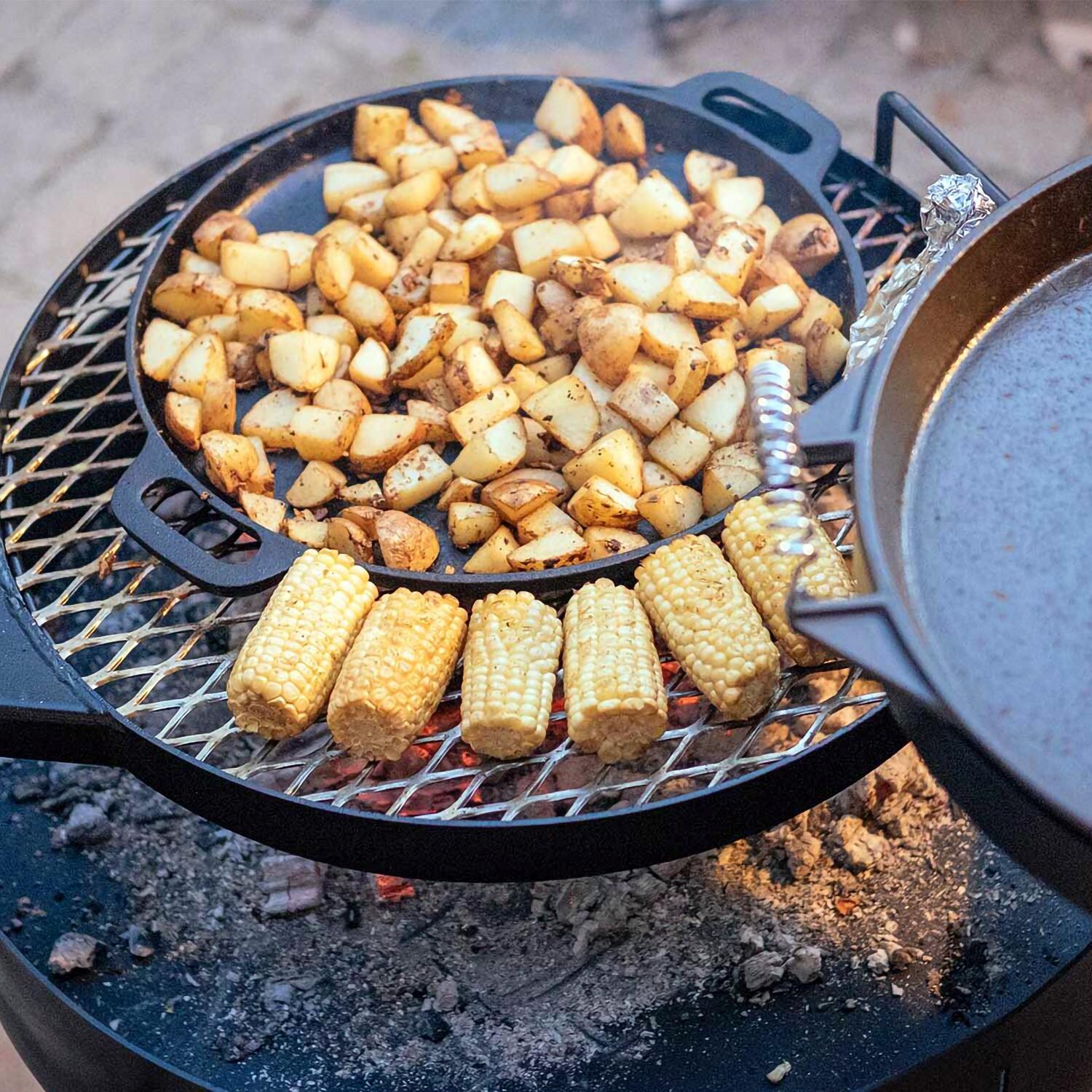KUDU 24-Inch Charcoal Grill - Grilling Corn & Potatoes On The Stainless Steel Grate thumbnail
