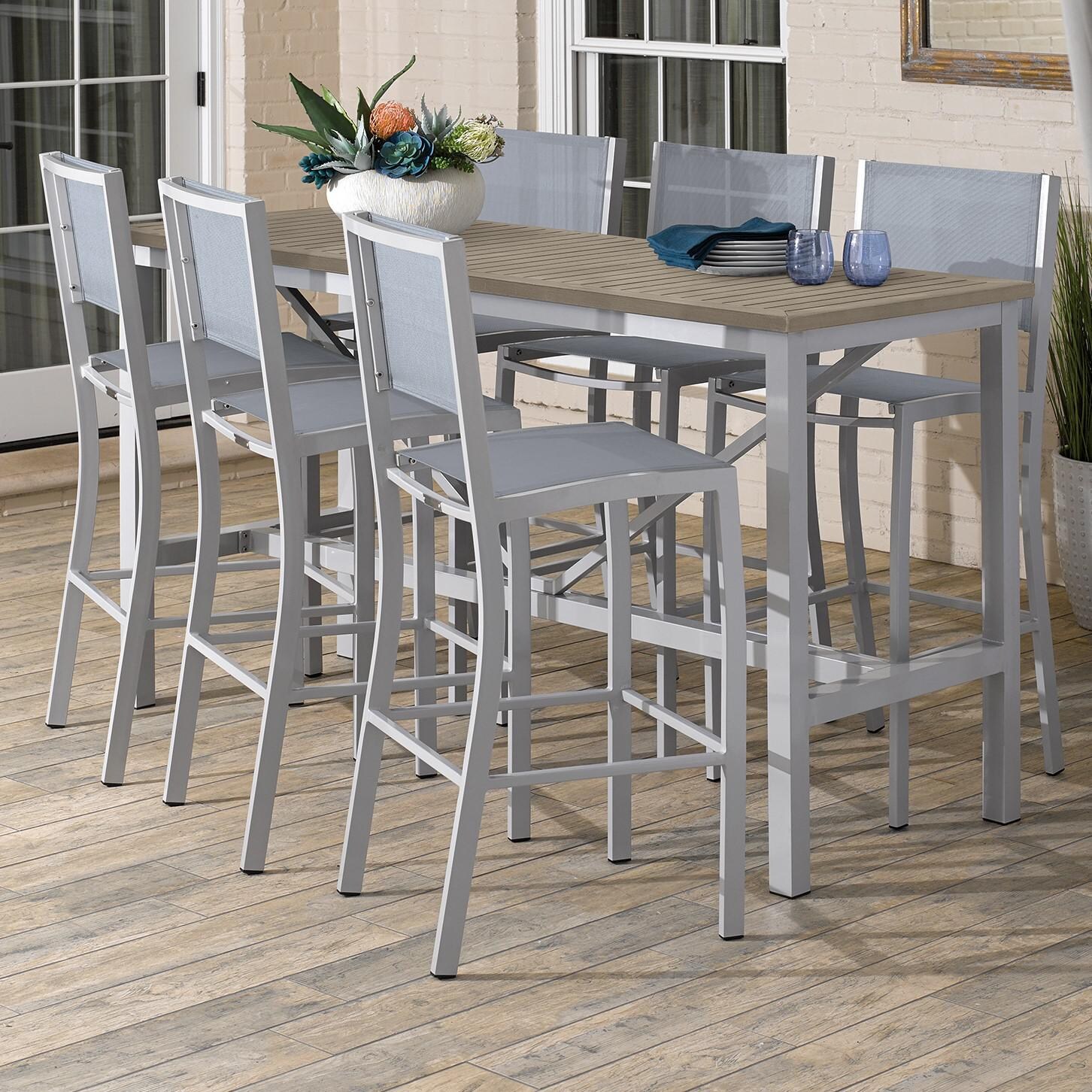 Travira 7 Piece Aluminum Patio Bar Set W/ 72 X 30 Inch Rectangular Table and Tekwood Vintage Tabletop By Oxford Garden - On The Patio thumbnail