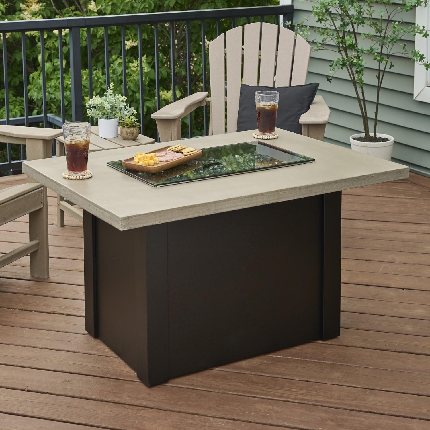 Havenwood 44 Inch Fire Pit Table W/ Pebble Grey Top & Black Base - Cover W/ Props - Lifestyle thumbnail