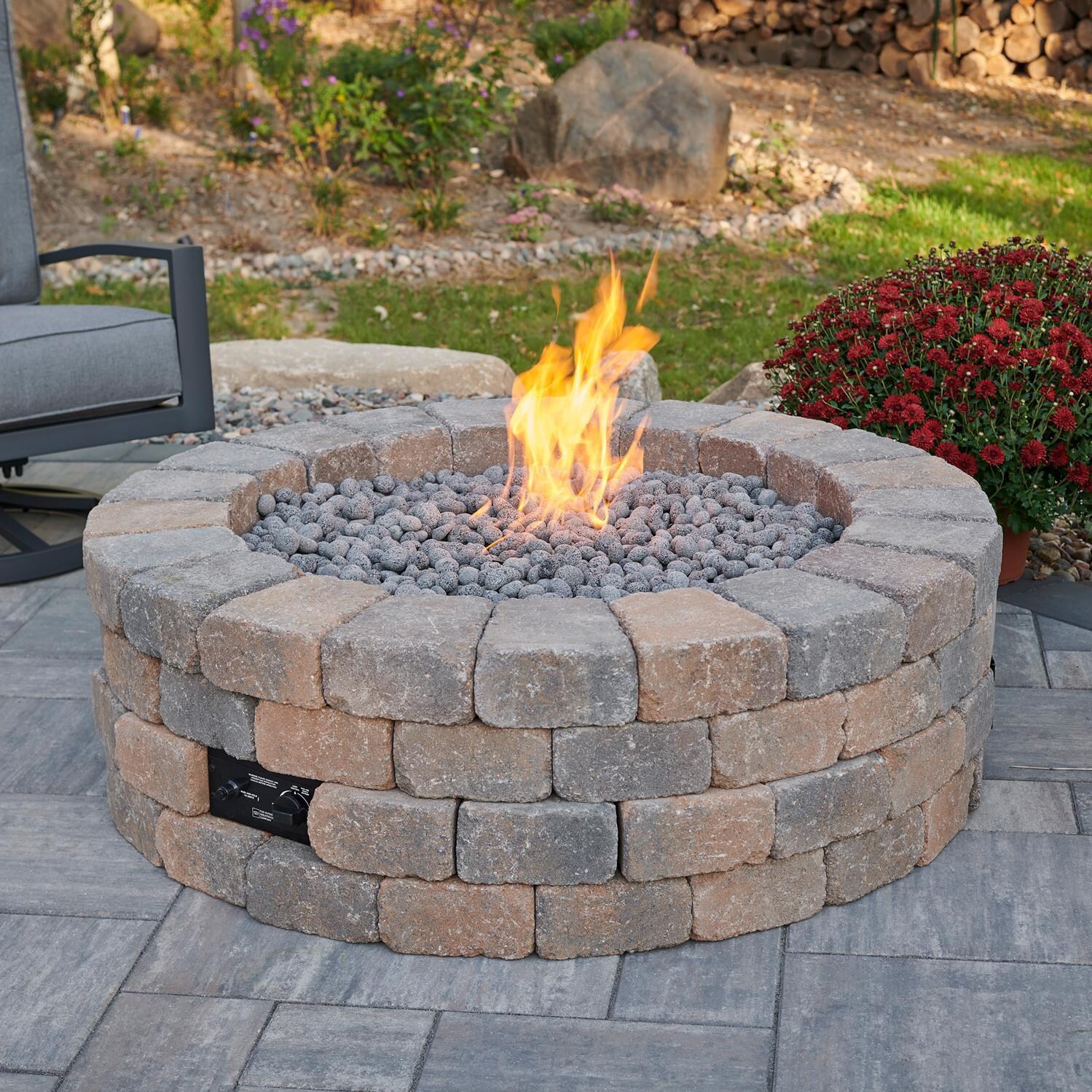 Abbey Bay 51 Inch Round Concrete Natural Gas Fire Pit Enclosure in Brown by Lakeview Outdoor Designs