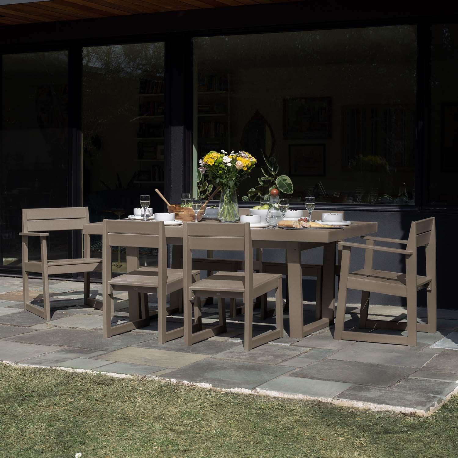Hazel Cove 7 Pc Recycled Plastic Dining Set in Cabana Tan by Lakeview Outdoor Designs - Side View - Lifestyle thumbnail