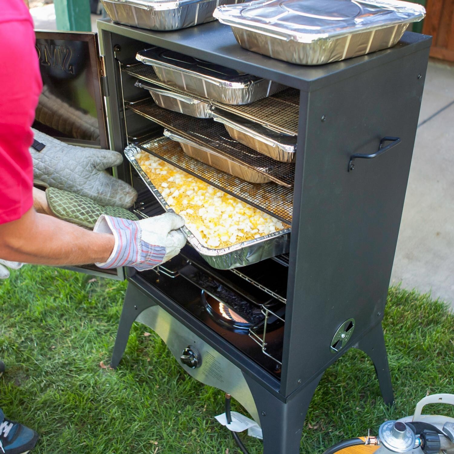 Camp Chef 24-Inch Smoke Vault Propane Gas Smoker - Shown Baking Food thumbnail