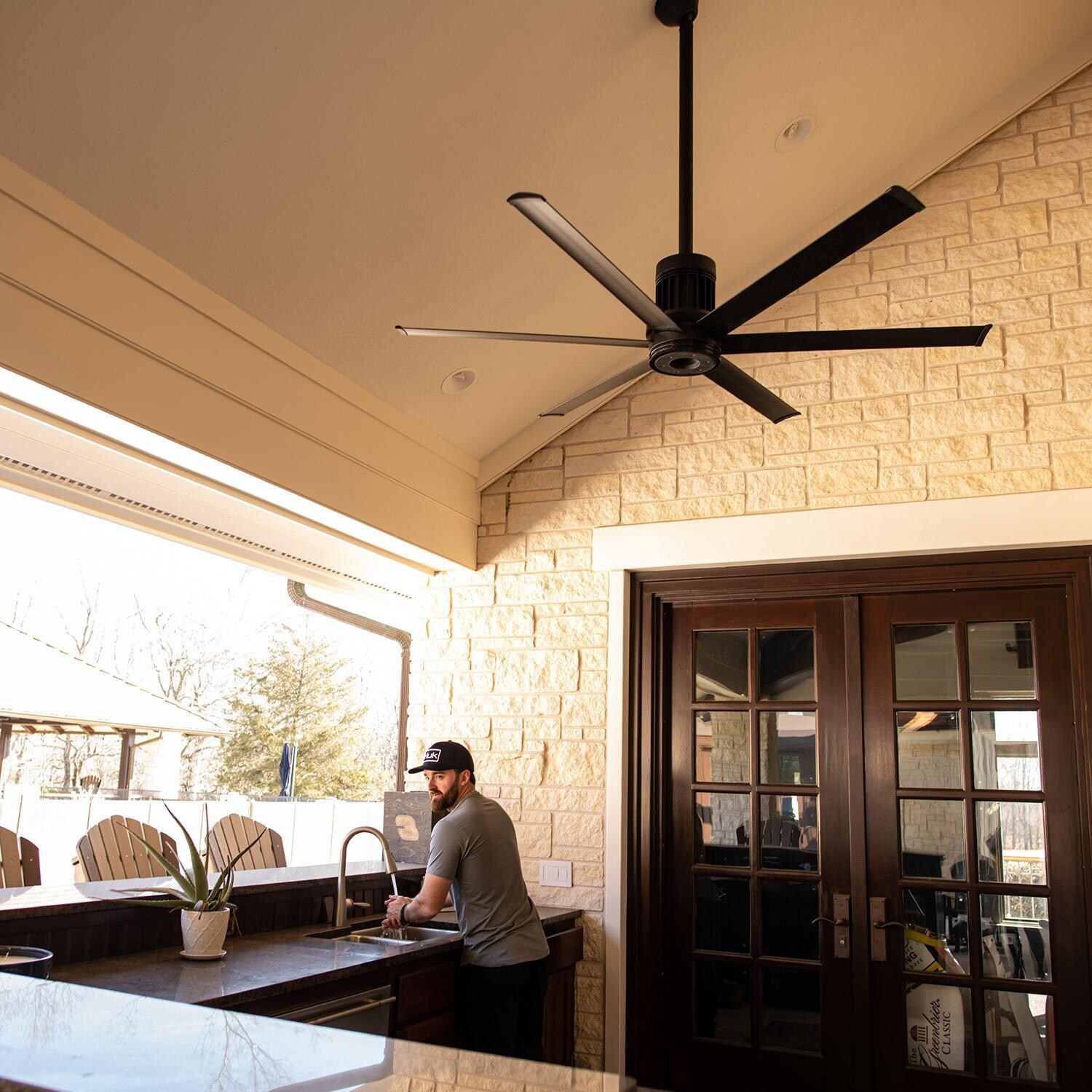 Big Ass Fans MK-I61-061906A730I06 72-Inch i6 Ceiling Fan Universal Mount W/6-Inch Ext Tube Oil Rubbed Bronze - With People - Lifestyle thumbnail