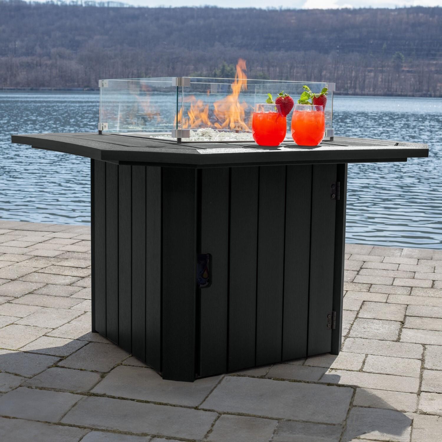 Harborview Octagonal Fire Pit Table in Black by Lakeview Outdoor Designs - Side View - Lifestyle thumbnail