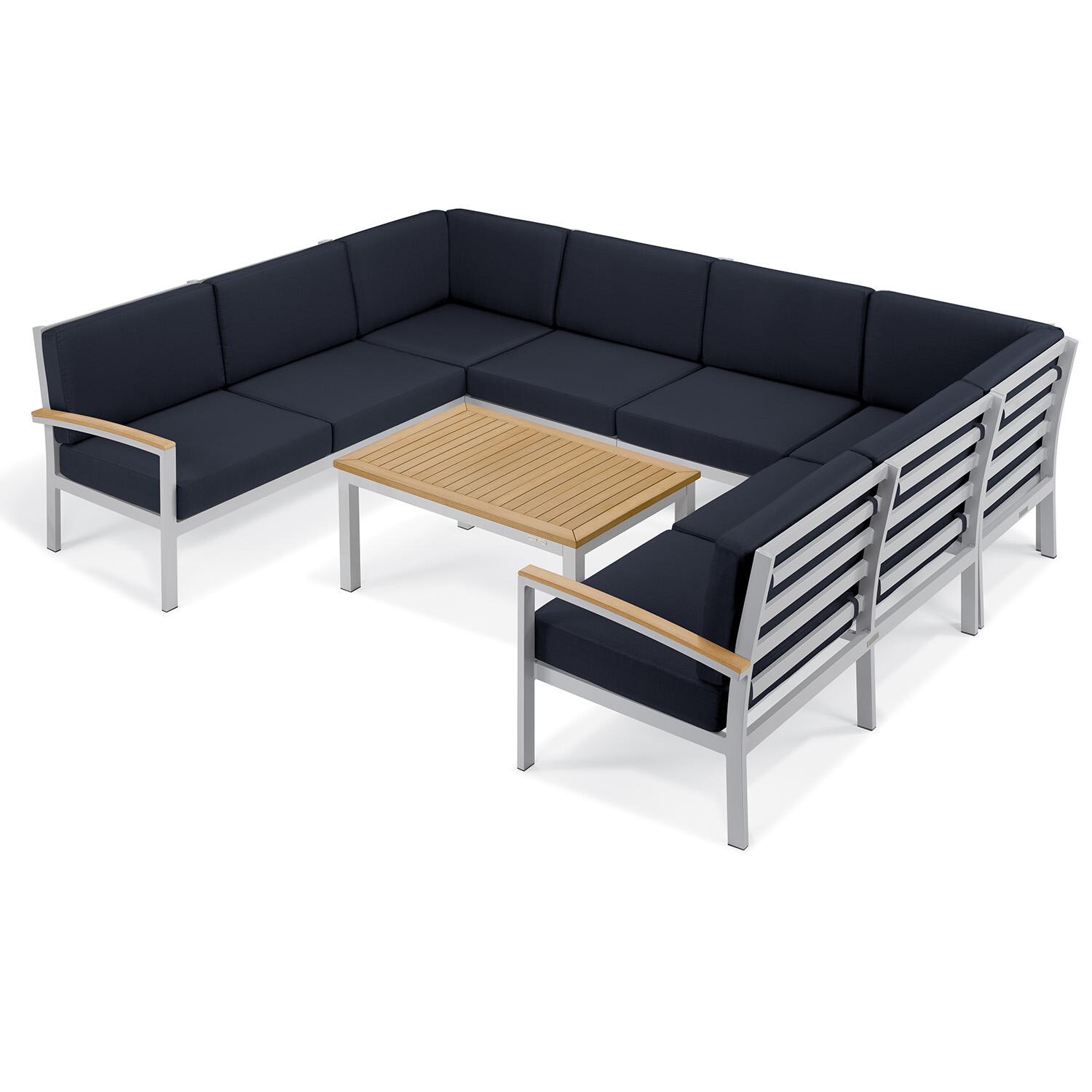 Oxford Garden 5259-PC.F Travira 7 Pc Aluminum Seating Set w/ Coffee Table in Natural Tekwood/ Midnight Blue by Oxford Garden - Set - White Background thumbnail