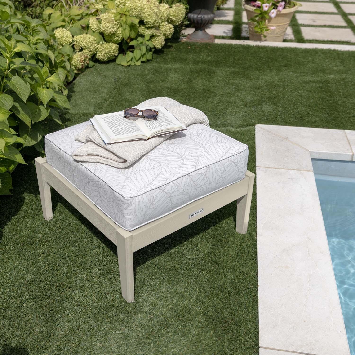 Blushing Bay Recycled Plastic Ottoman in Lively Parchment/Whitewash by Lakeview Outdoor Designs - By Pool Close Up - Lifestyle thumbnail