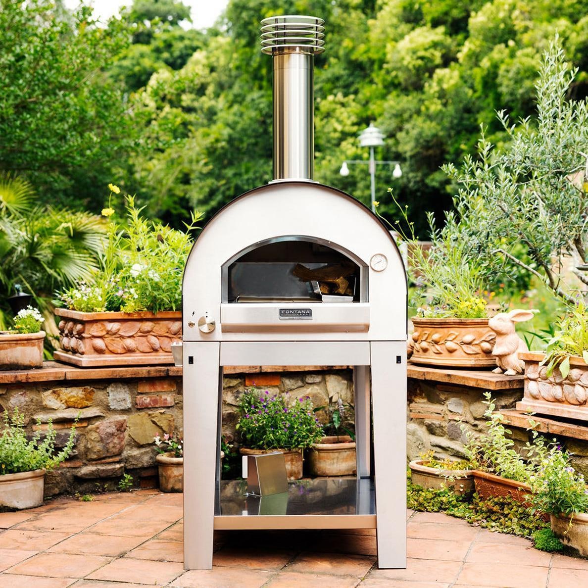 Fontana Forni FTNAP-H-S Napoli Hybrid Pizza Oven - Stainless Steel - On the Patio (Shown on Cart) - Lifestyle thumbnail