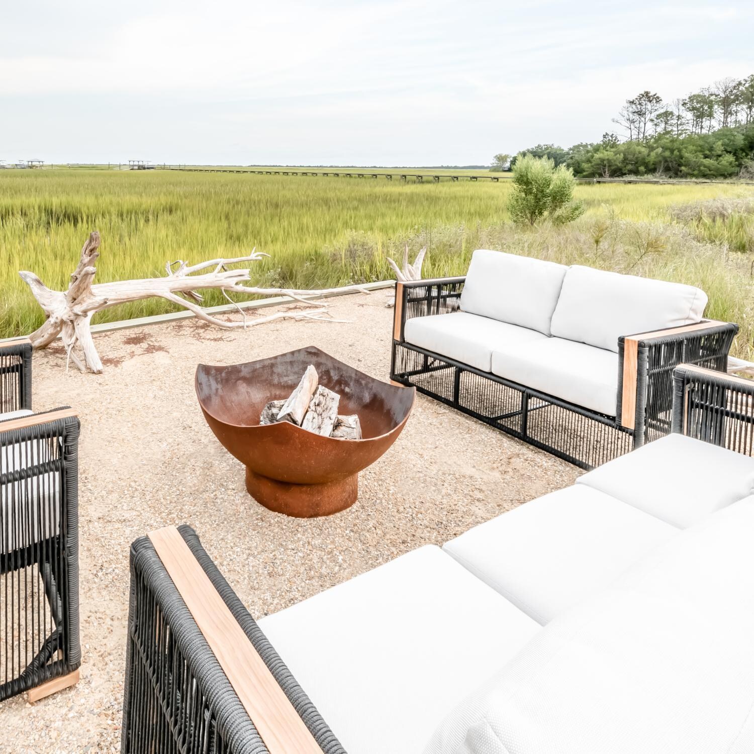 Teak + Table Breeze Olefin Rope & Teak Patio Loveseat in Charcoal/Natural - Around the Firepit - Lifestyle thumbnail
