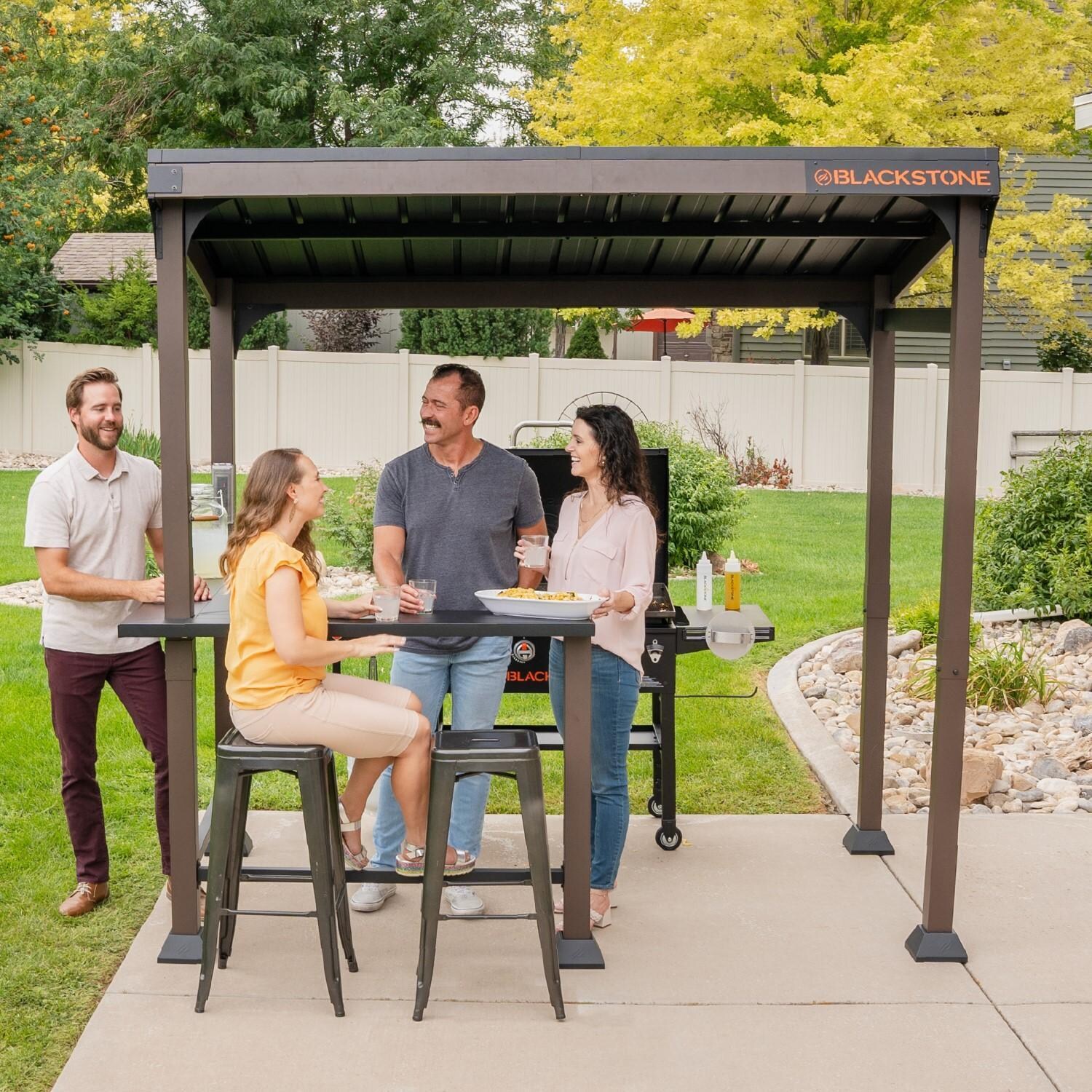 Blackstone 5 x 8-Foot Outdoor Pavilion - Friends Gathered - Front View - Lifestyle thumbnail