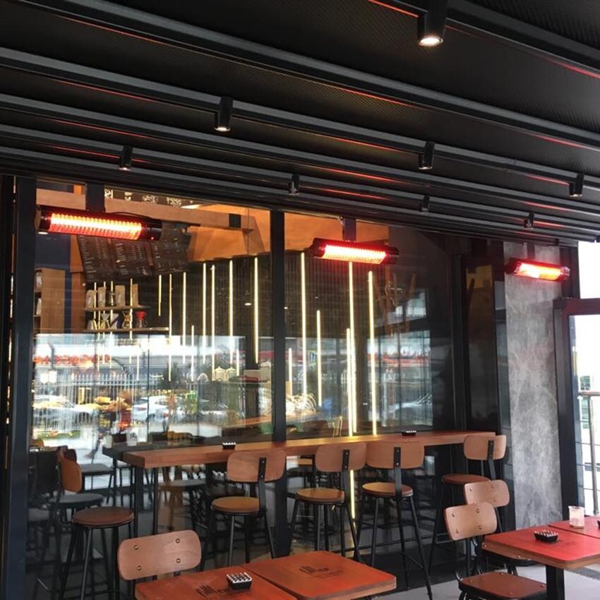 RADtec T6000/18R2 Torrid Series 77-in 6000W Electric Infrared Patio Heater - Restaurant - Lifestyle thumbnail