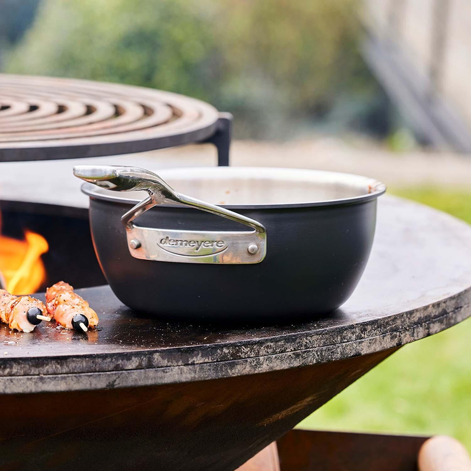 Demeyere 1026933 Black 5 Stainless Steel 2 Qt Saucepan W/Lid - Using On Grill - Lifestyle thumbnail