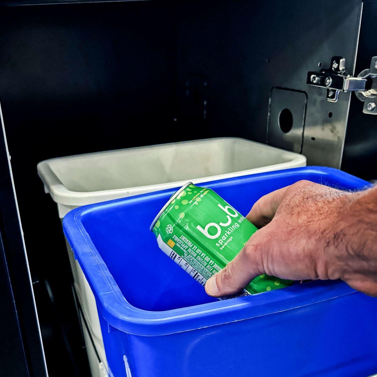 Broil King 876847 Baron 590i Shadow 5 Burner Natural Gas Grill Center w/ Rotisserie & Side Burner - Accessible Trash Bins for Recycle - In Use - Lifestyle thumbnail