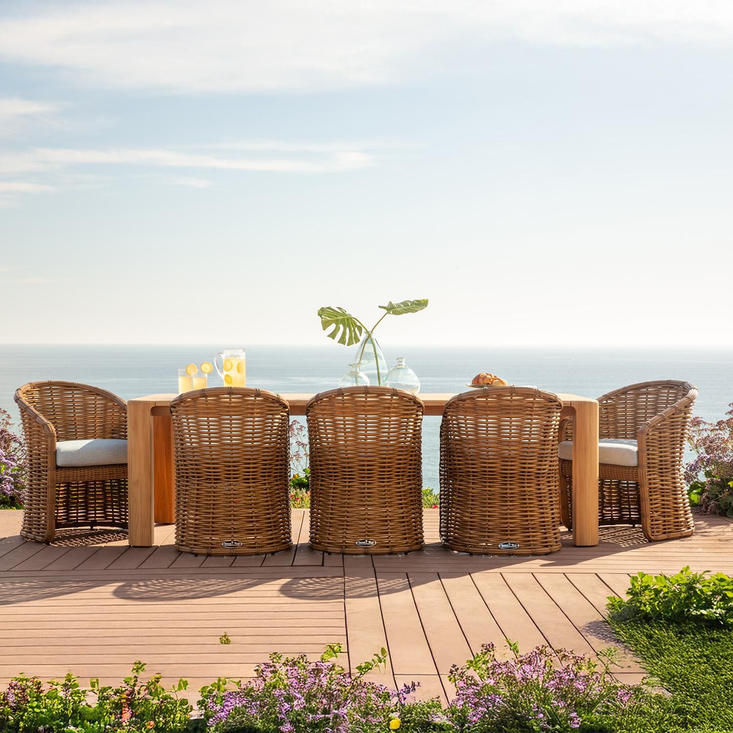 Playa Resin Wicker Dining Arm Chair in Medium Wood/Soothe Pearl by Sunset West - With Large Table (Shown as Set) - Lifestyle thumbnail
