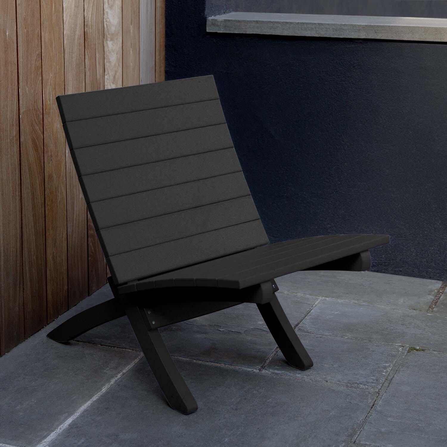 Hazel Cove Recycled Plastic Folding & Stacking Dining Side Chair in Black Sand by Lakeview Outdoor Designs - Right Side View - Lifestyle thumbnail