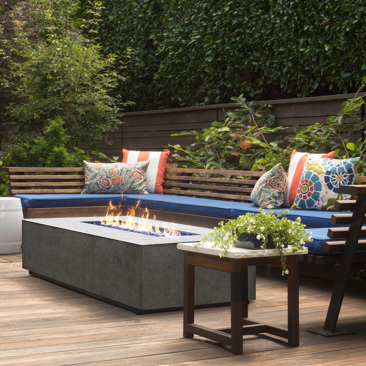 60-in Rectangular Concrete Natural Gas Fire Pit in Limestone by XO Appliance - Outdoor Lounge Area - Shown in Gray finish - Lifestyle thumbnail