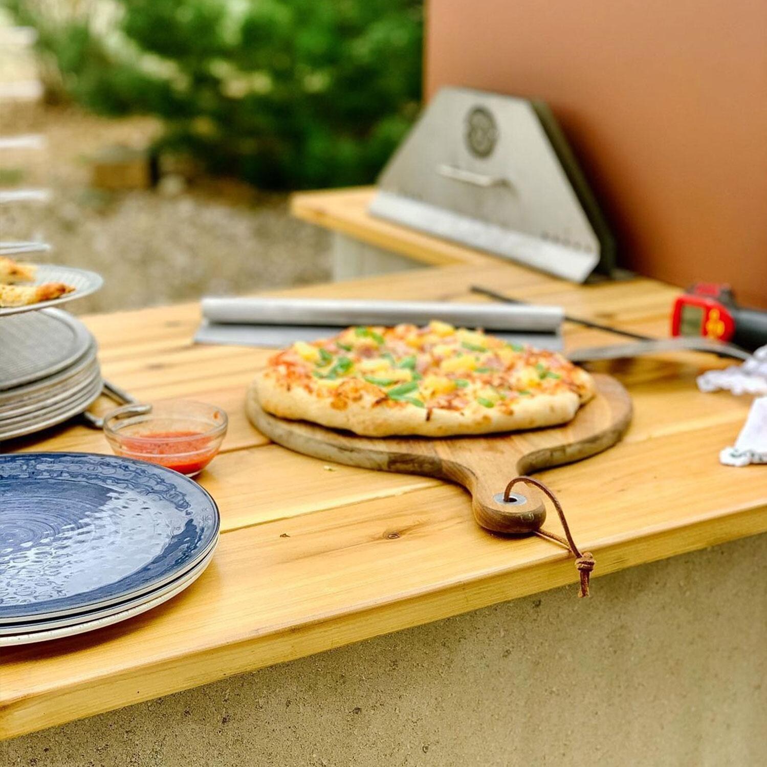 Chicago Brick Oven CBO-750 Countertop Wood Fired Pizza Oven w/ Cover - Silver - Pizza Ready To Serve - Lifestyle thumbnail