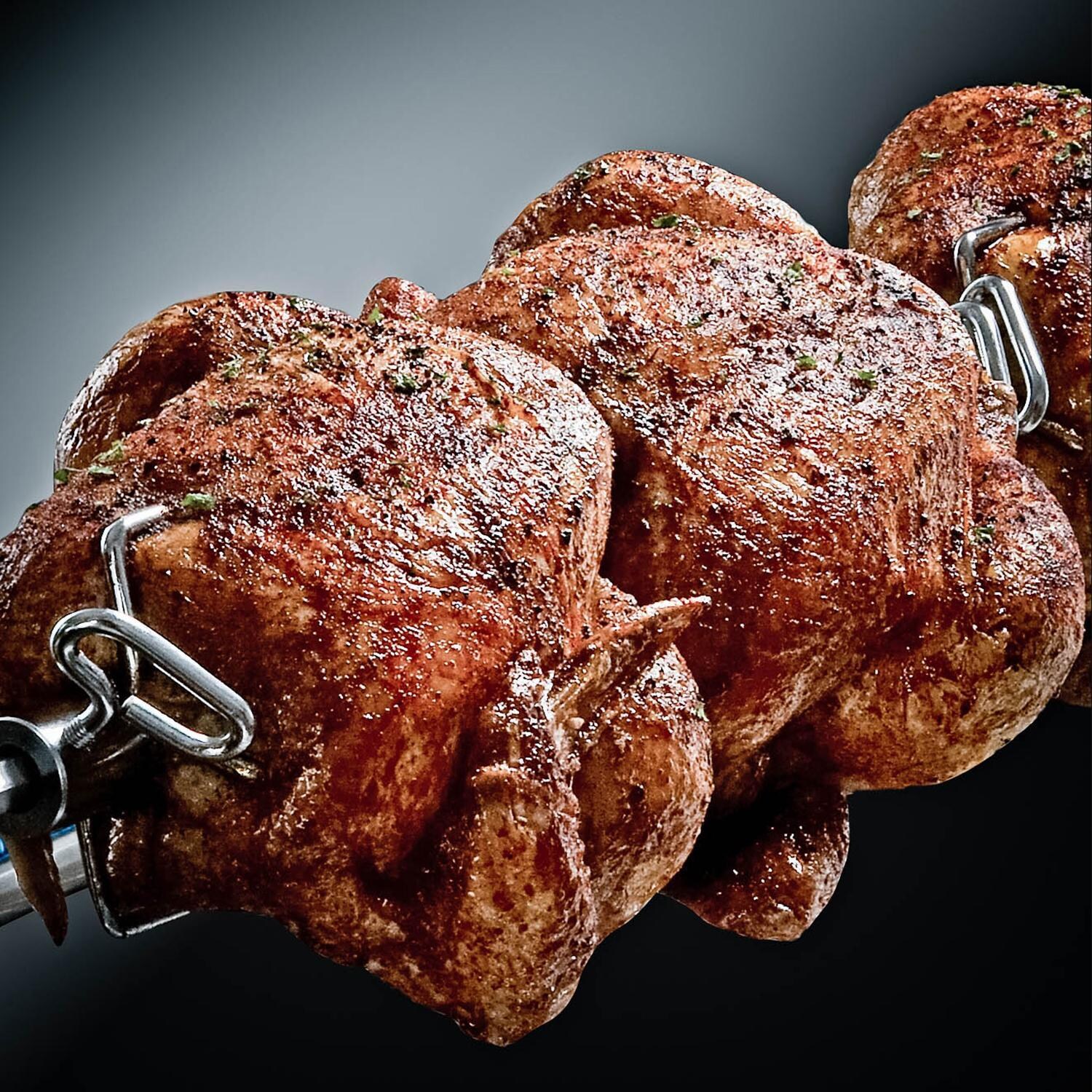 Broil King 958947 Regal S590 PRO IR 32-Inch Natural Gas Grill - Chicken on Rotisserie - Lifestyle thumbnail