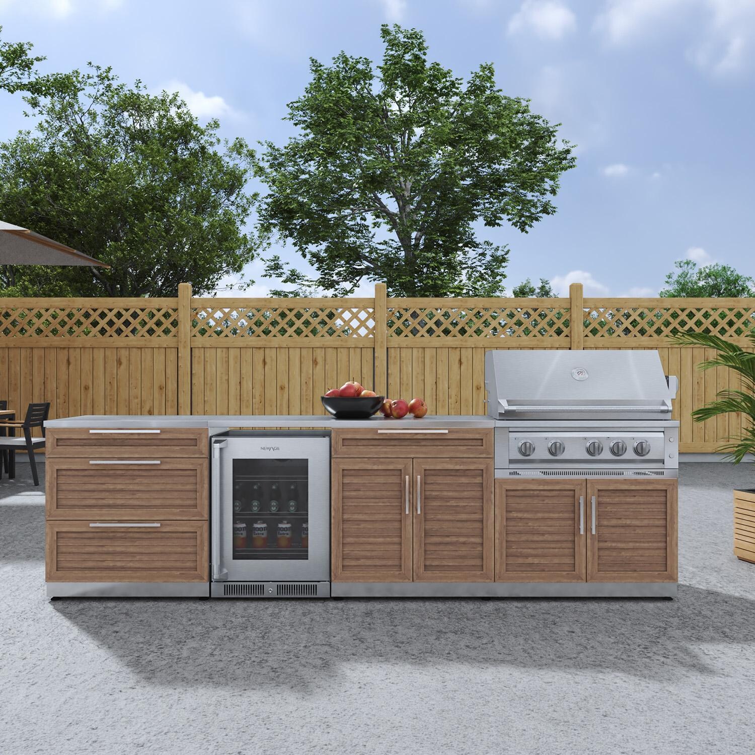 NewAge Products 67914 Classic Series 10 1/2 Ft Outdoor Kitchen Island w/ 36-in Propane Grill, Glass Door Refrigerator, Trash Bin, Door & Drawer in Grove/Stainless Steel - On Patio - Lifestyle thumbnail