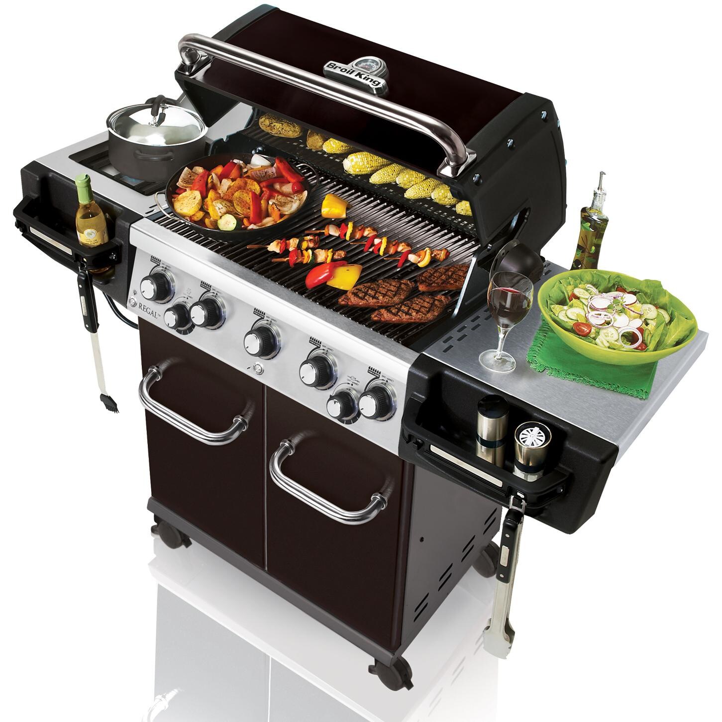 Broil King Regal 590 Pro 5-Burner Freestanding Gas Grill - Angled View With Food thumbnail