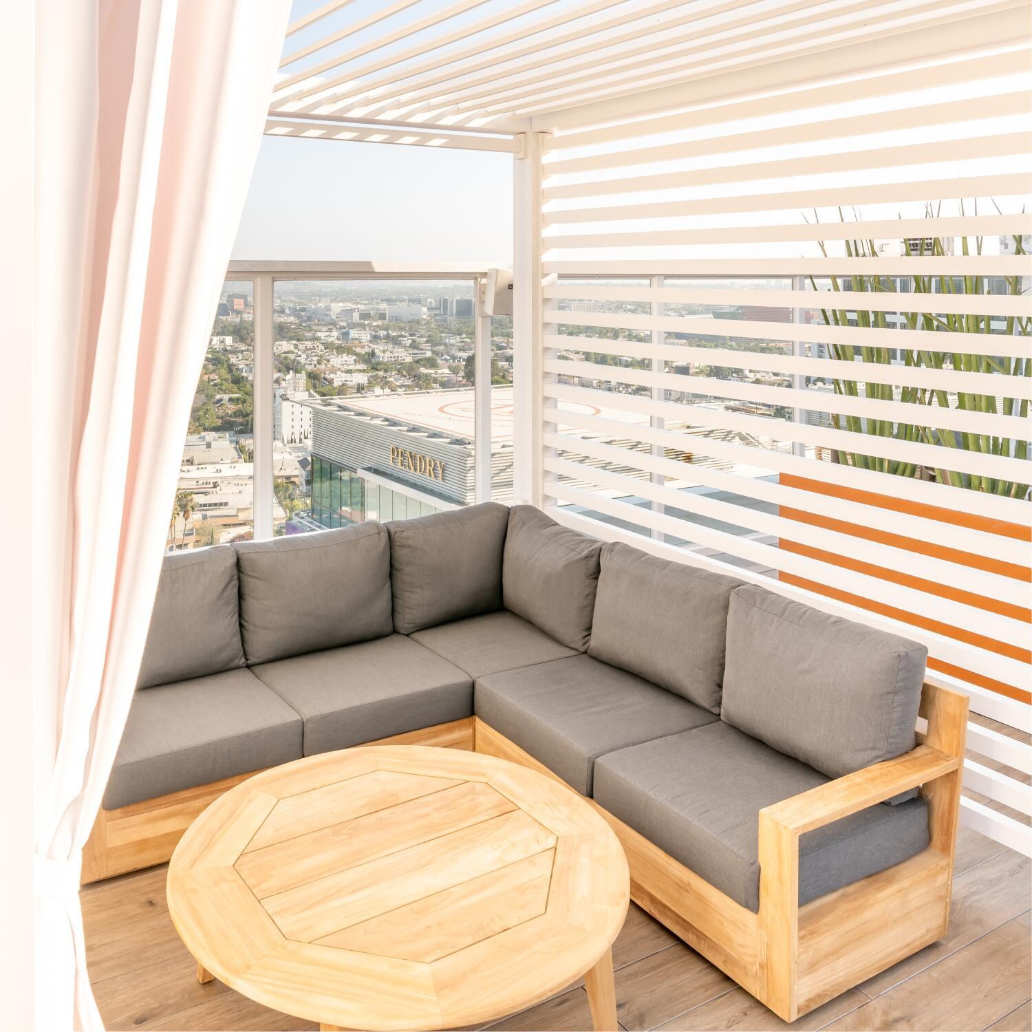 Teak + Table Cayman 43 Inch Round Coffee Table - Lifestyle thumbnail