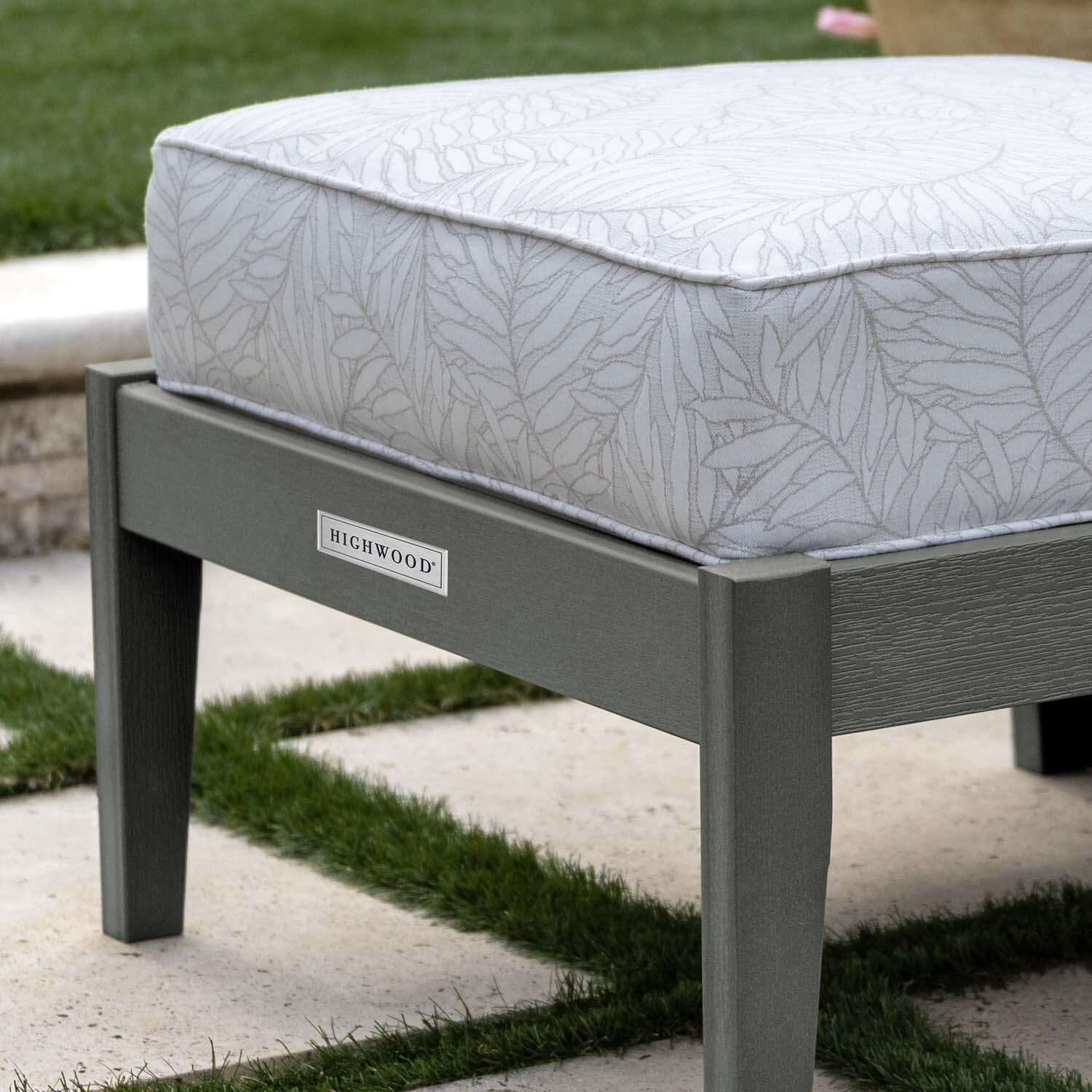 Blushing Bay Recycled Plastic Ottoman in Lively Parchment/Coastal Teak by Lakeview Outdoor Designs - Close Up - Lifestyle thumbnail