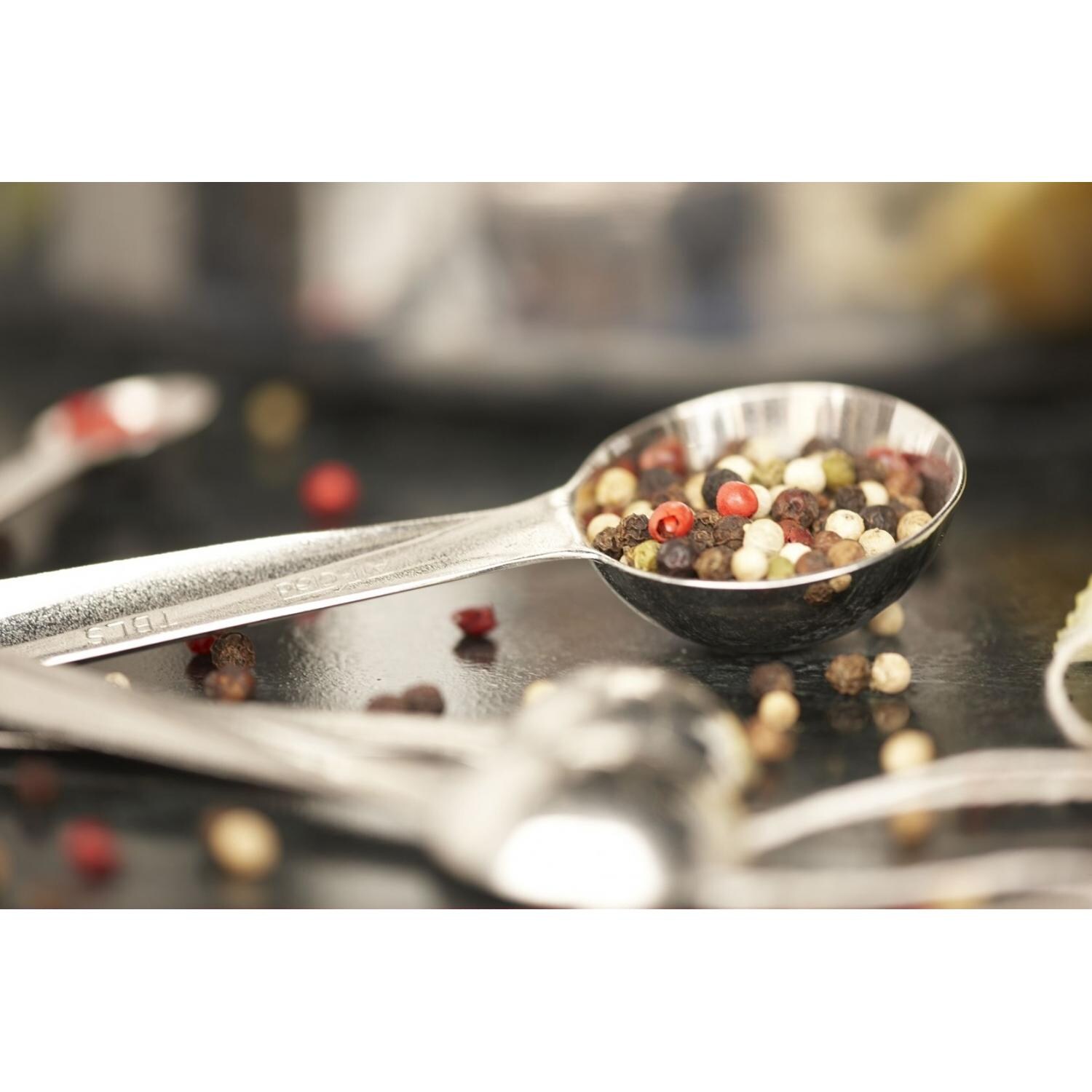 All-Clad Stainless Measuring Spoon Set In Use thumbnail