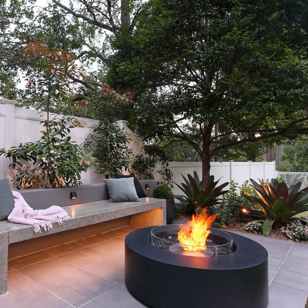 EcoSmart Fire ESF.O.ARK.40.GH.B Ark 40 Inch Black Burner Round Concrete Ethanol Fire Pit Table in Black Graphite - On the Patio - Lifestyle thumbnail