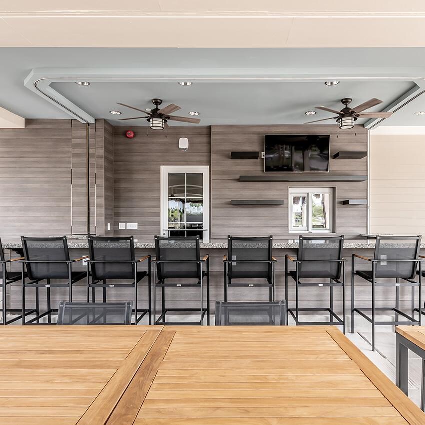 Teak + Table St Barts Aluminum Bar Chair in White - Chairs at Bar - Lifestyle thumbnail