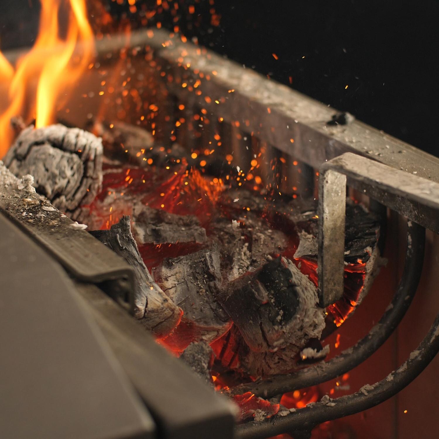 Nuke DELTACT02 47-Inch Argentinian-Style Countertop Gaucho Grill - Firebox & Poker Closeup thumbnail