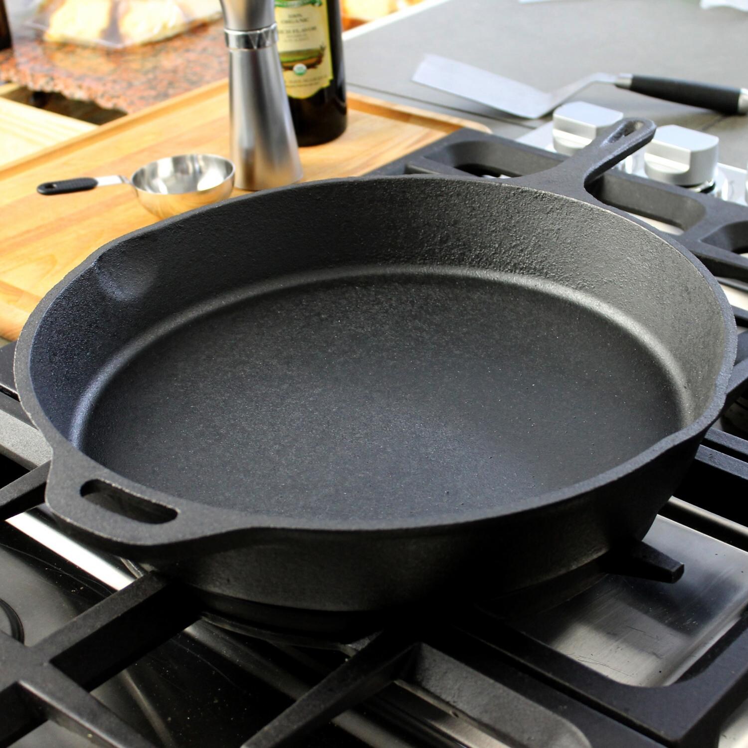Cajun Cookware 15 Inch Seasoned Cast Iron Skillet on Stove Top thumbnail