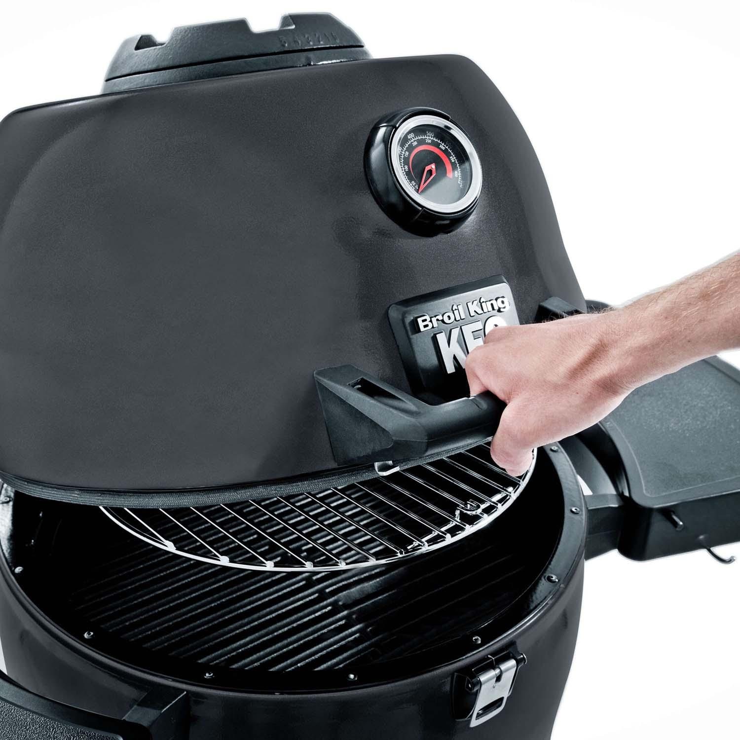 Broil King Keg 5000 Steel Charcoal Kamado Grill - Gray - Opening Lid - Lifestyle thumbnail