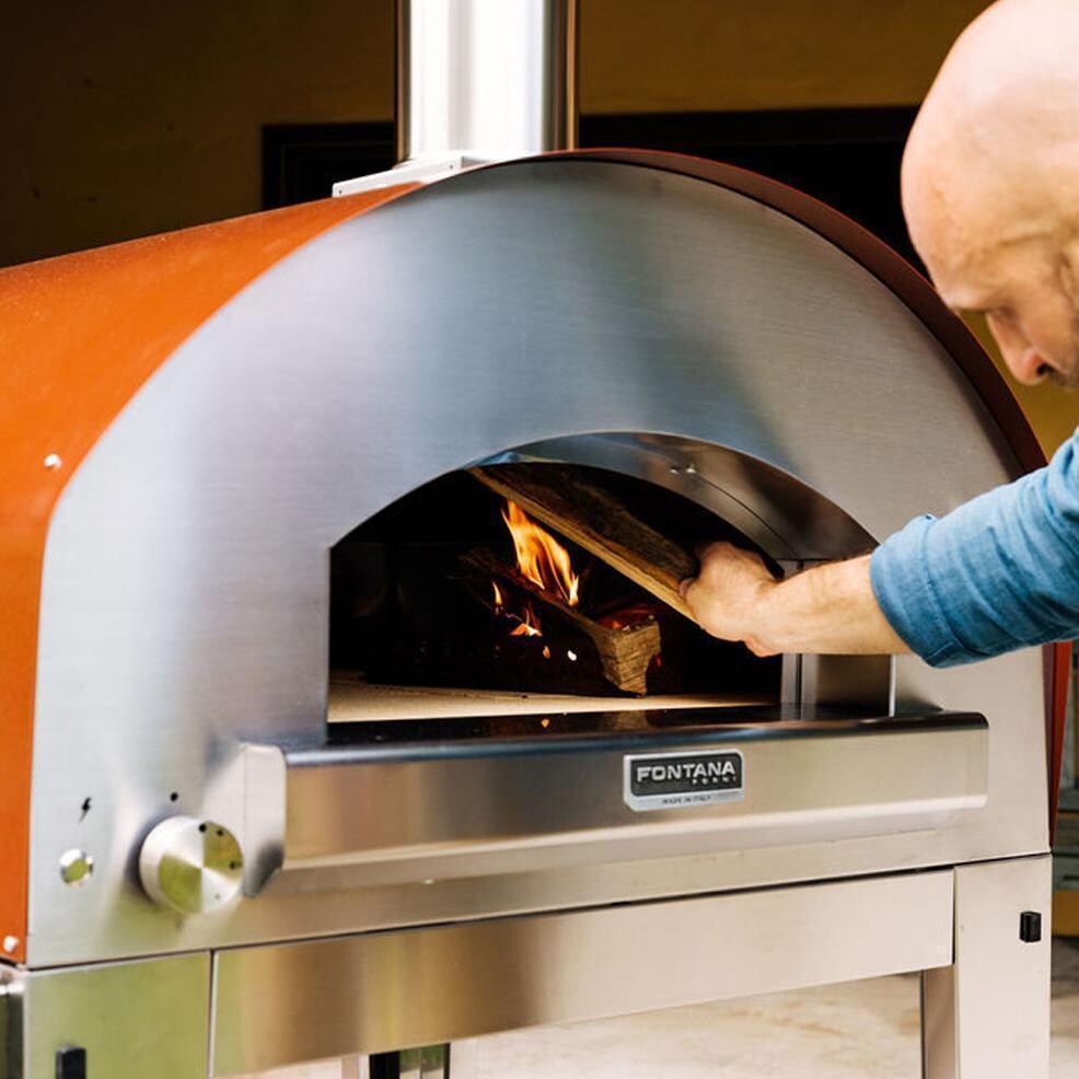Fontana Forni FTROM-H-R + FTCART-XL Roma Hybrid Pizza Oven on Cart - Red - Using Wood - Lifestyle thumbnail