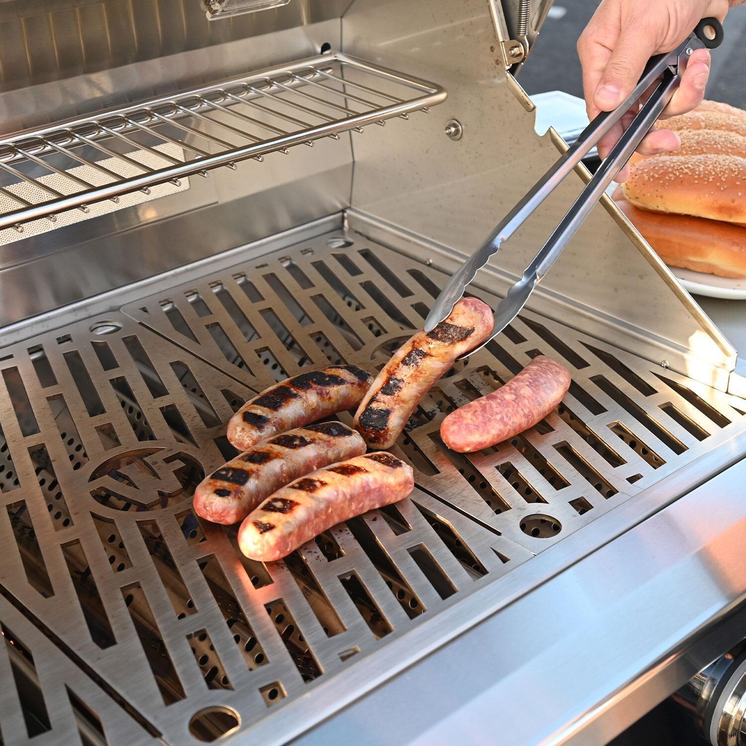 Wildfire Ranch Pro 36-in Black 304 SS Natural Gas Grill w/ Freestanding Cart - Flipping Hot Dogs - Lifestyle thumbnail