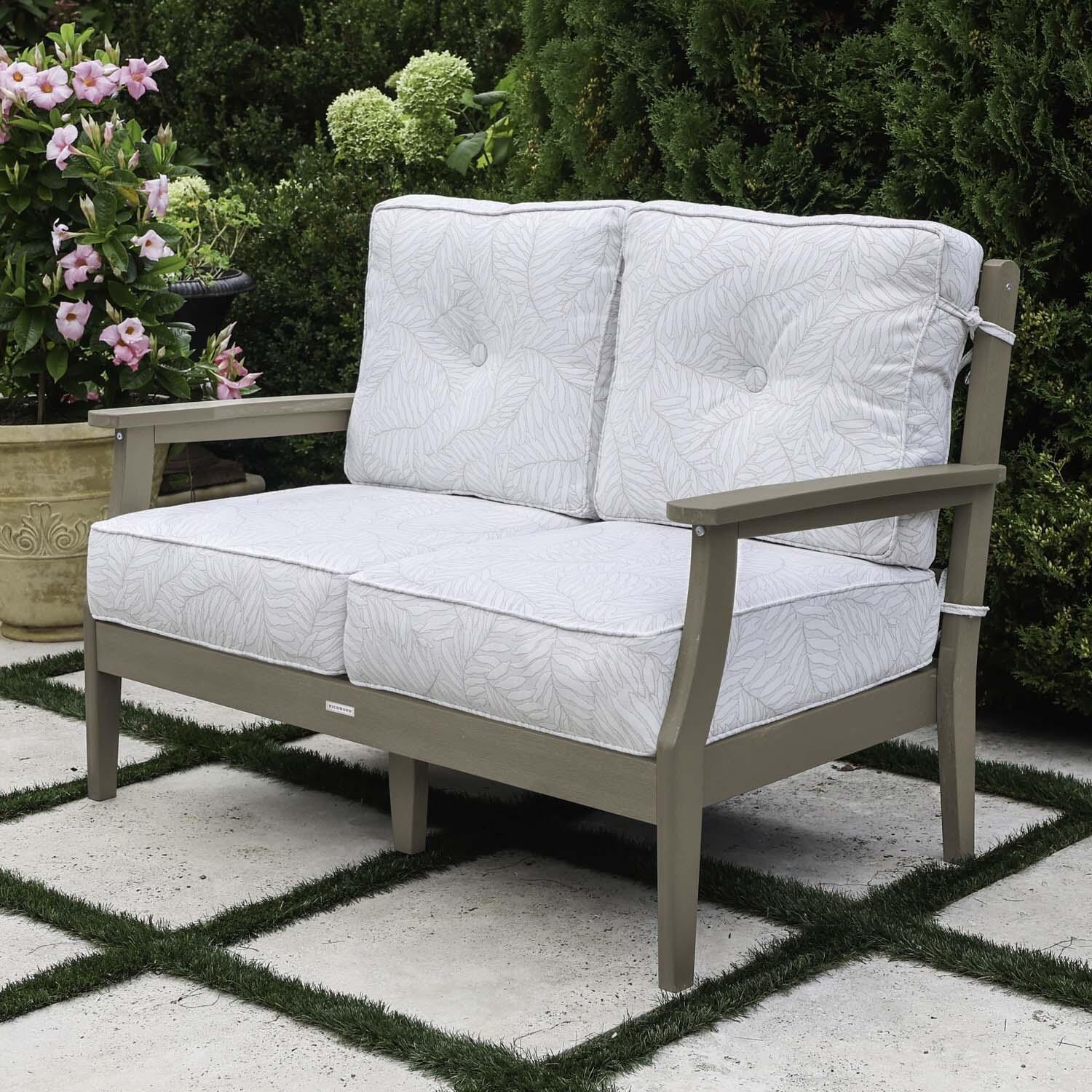 Blushing Bay 2 Person Recycled Plastic Loveseat in Lively Parchment/Woodland Brown by Lakeview Outdoor Designs - Right Angled - Lifestyle thumbnail