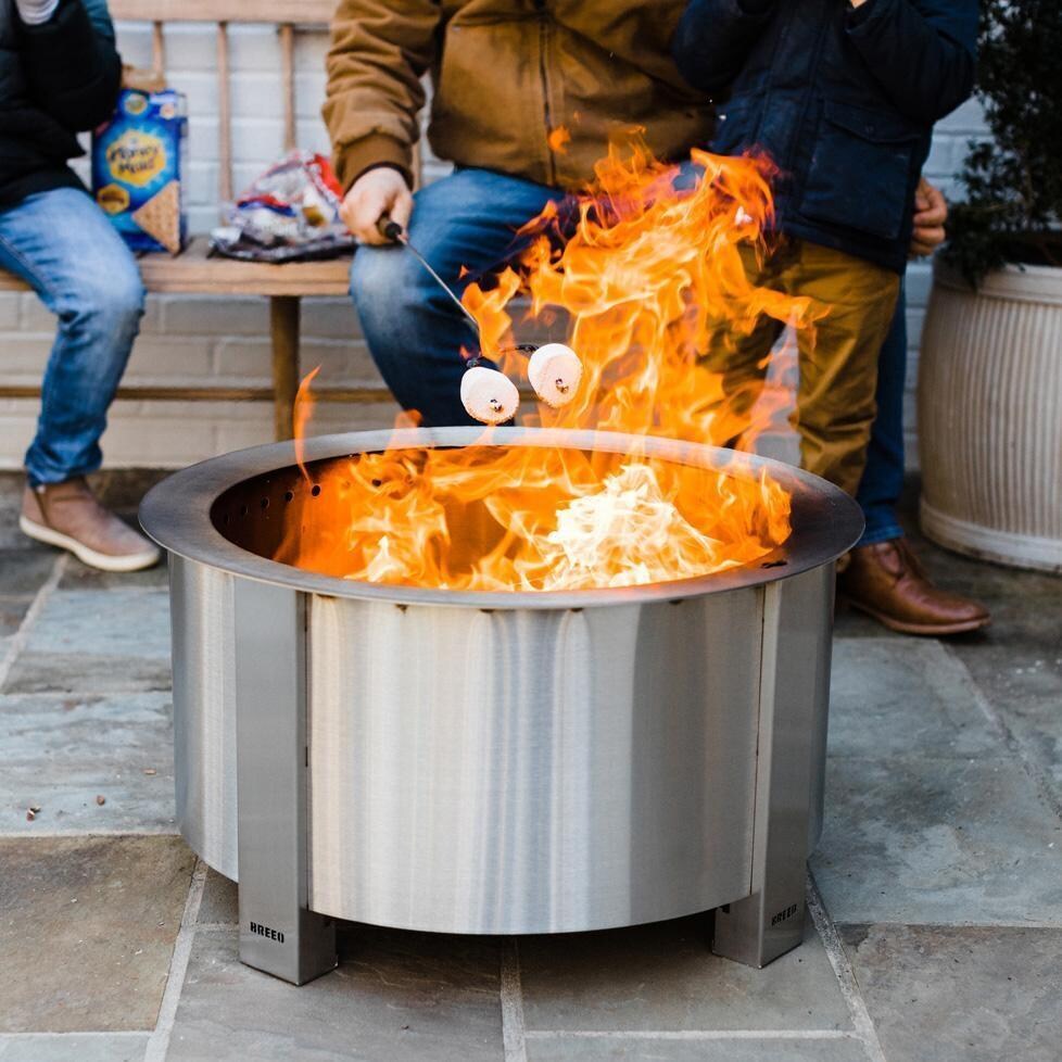 Breeo BR-X24S X Series 24 Inch Smokeless Round Stainless Steel Wood Burning Fire Pit - On the Patio - Lifestyle thumbnail