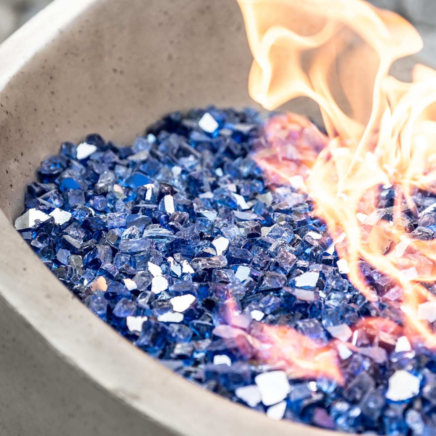 American Fyre Designs Wave 20-Inch Propane Gas Fire Urn - Smoke - Lifestyle - Shown with Alpine Flame Sky Blue Fire Glass (Sold Separately) thumbnail