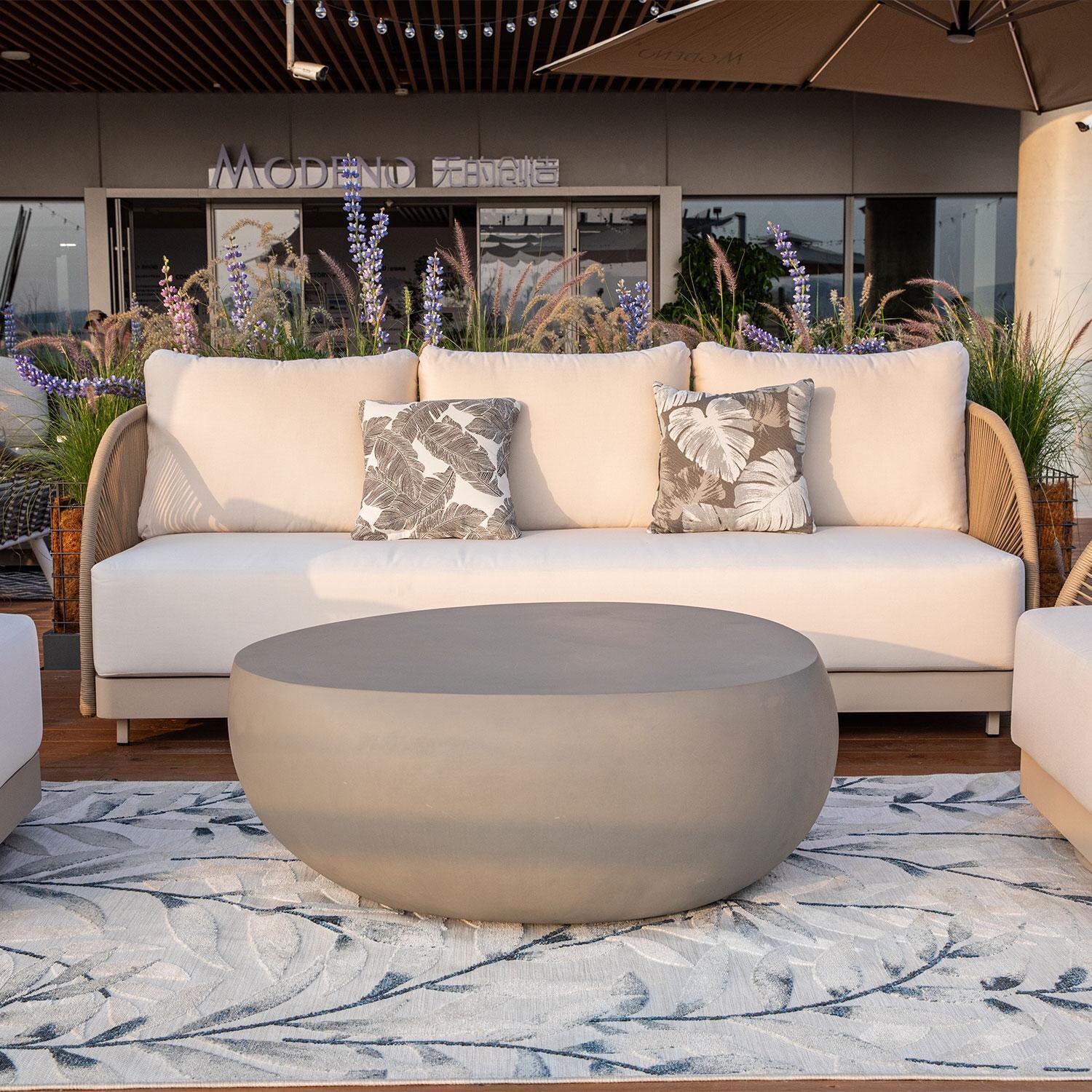 Elementi OS-2502T Malibu Outdoor Aluminum 3 Person Sofa w/ Sunbrella Cushions - Shown w/ Fire Pit (Sold Separately) - Lifestyle thumbnail