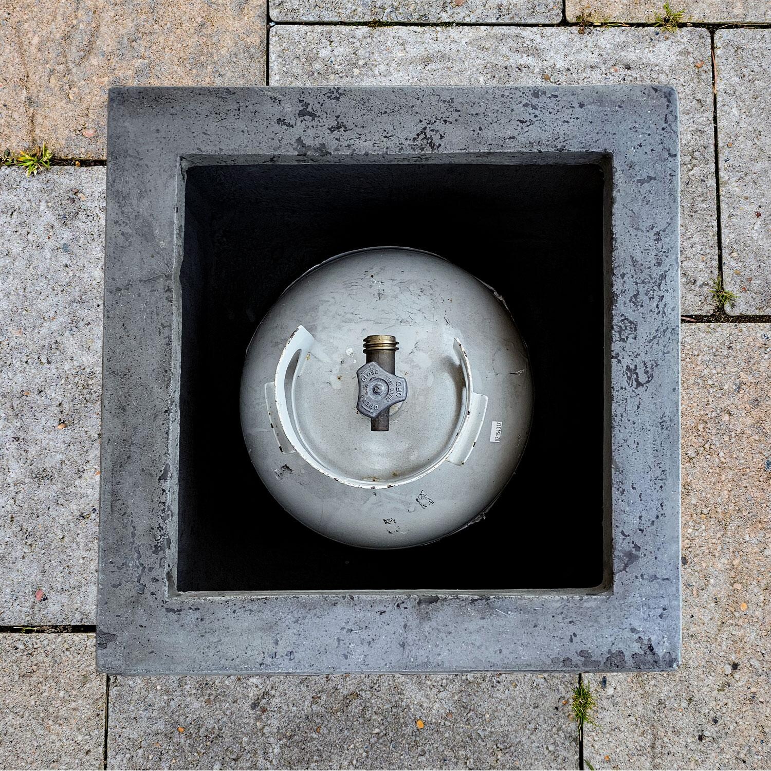 20-in Square Concrete Propane Fire Pit Enclosure in Limestone by XO Appliance - Propane Insert - Shown in Gray finish - Lifestyle thumbnail