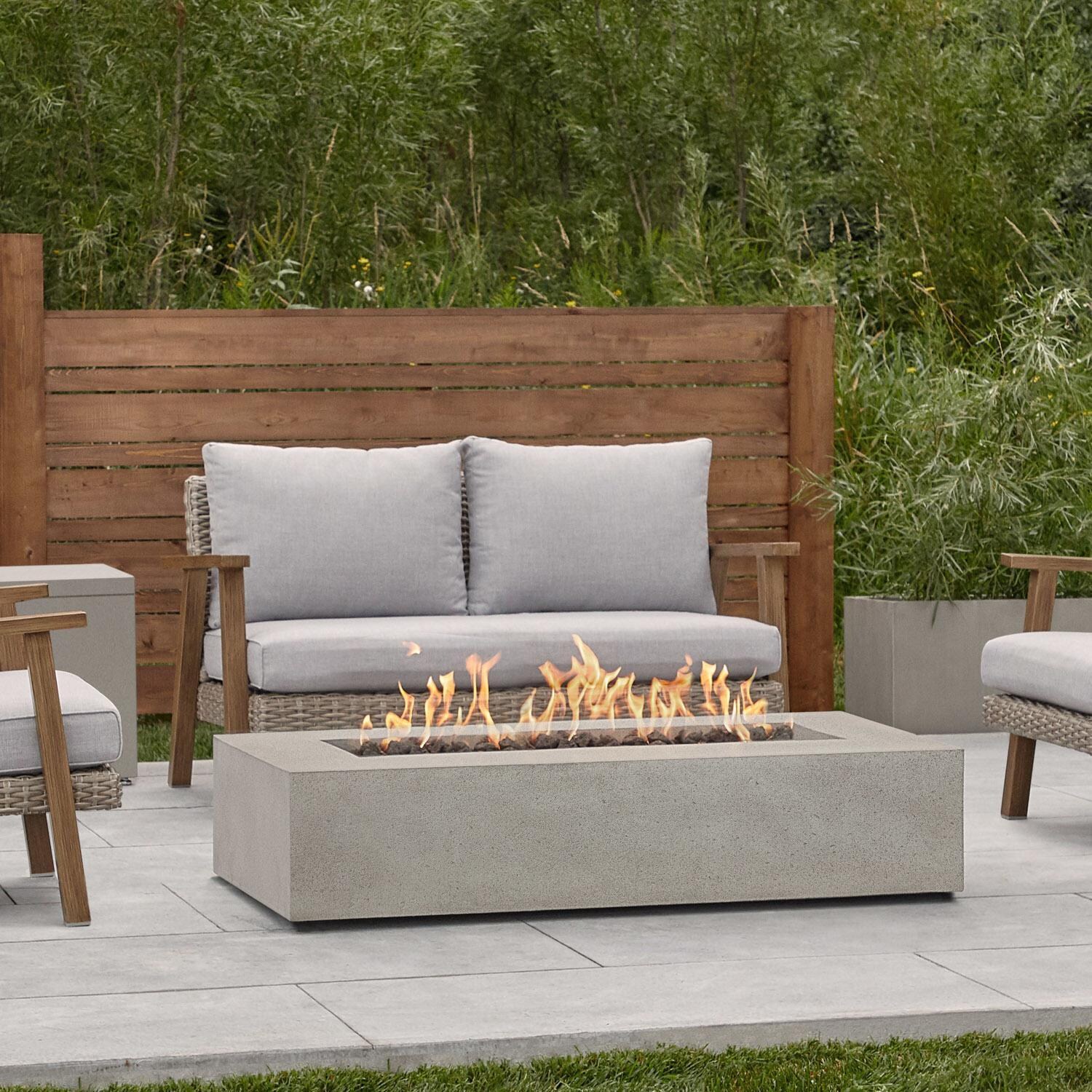 Hillview Bay 56 Inch Rectangular GFRC Propane Fire Pit in Flint by BBQGuys Signature