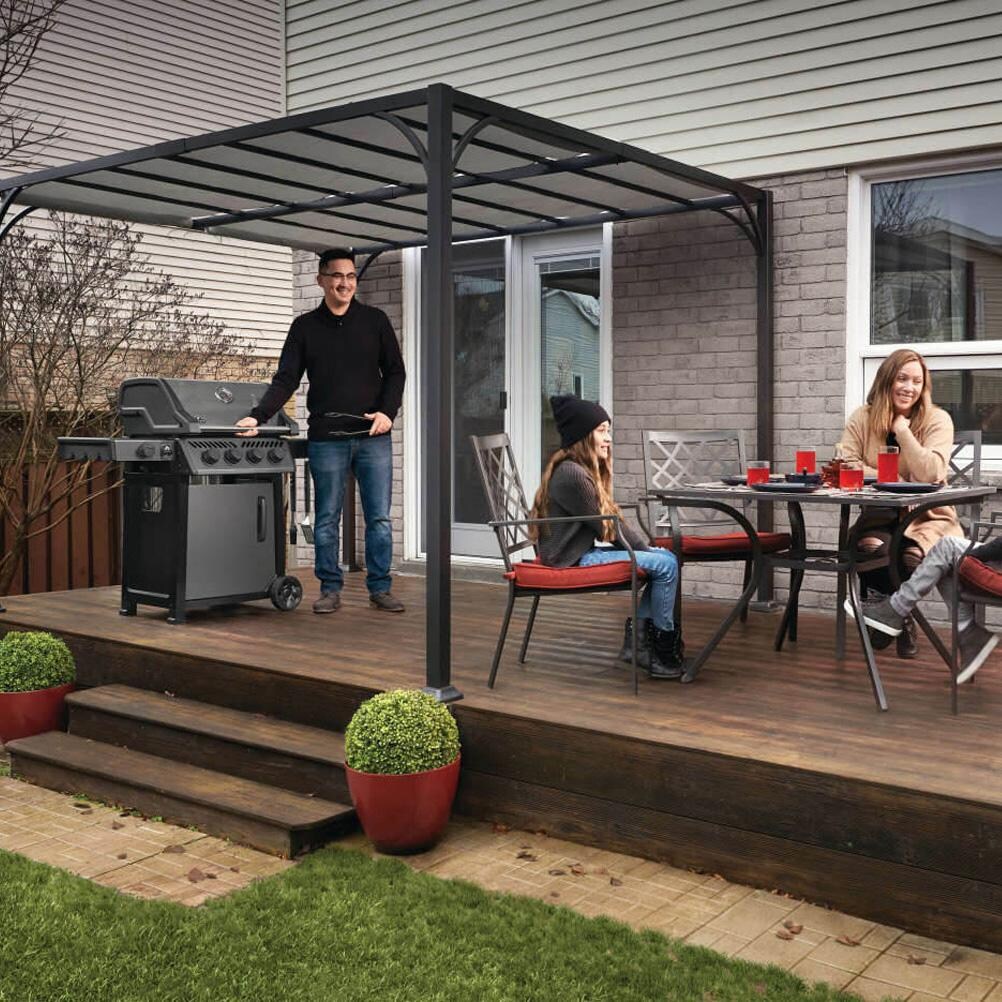 Napoleon F425DSBPGT-ECP Freestyle 425 4 Burner Propane Gas Grill w/ Range Side Burner - Graphite Grey - On Patio 2 - Lifestyle thumbnail