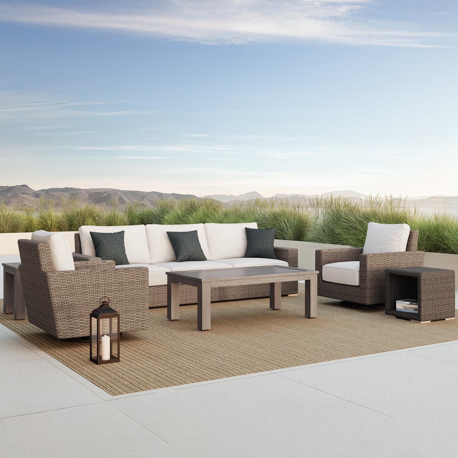 Coronado Wicker Club Chair Swivel Rocker in Driftwood/Canvas Henna by Sunset West - Shown w/ Set (Not Included) - Lifestyle thumbnail