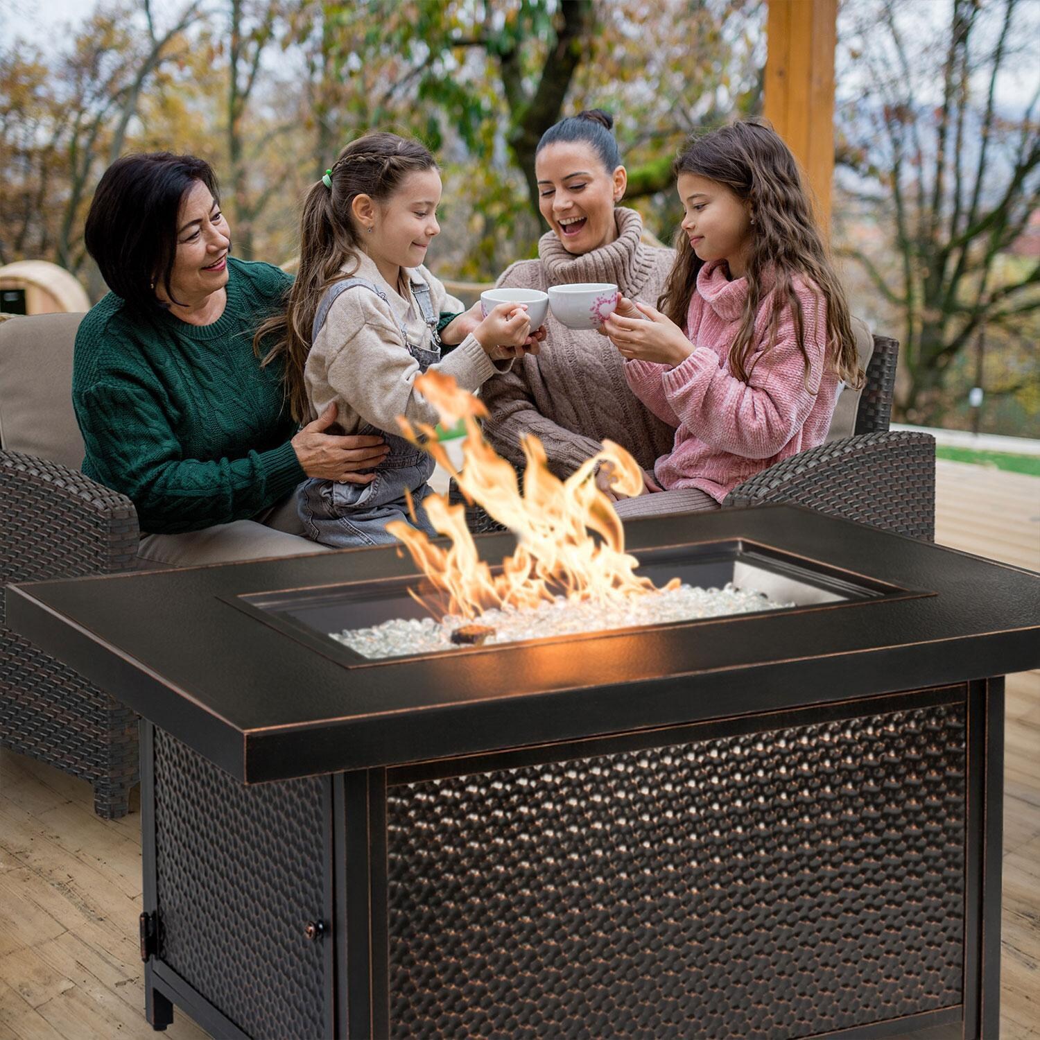 La Flore 5 Pc Resin Wicker Fire Pit Seating Set in Mocha by Ultimate Patio - Drinking Hot Chocolate By Fire - Lifestyle thumbnail