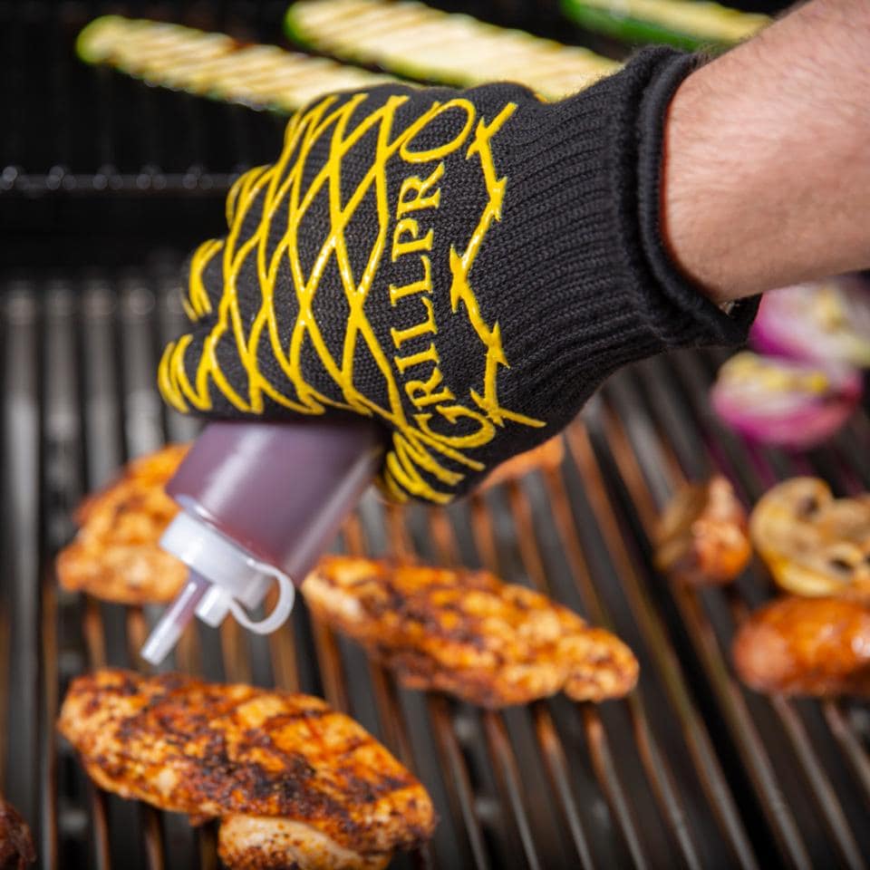 GrillPro Aramid Grill Mitt - 90974 - Holding Bottle - Lifestyle thumbnail