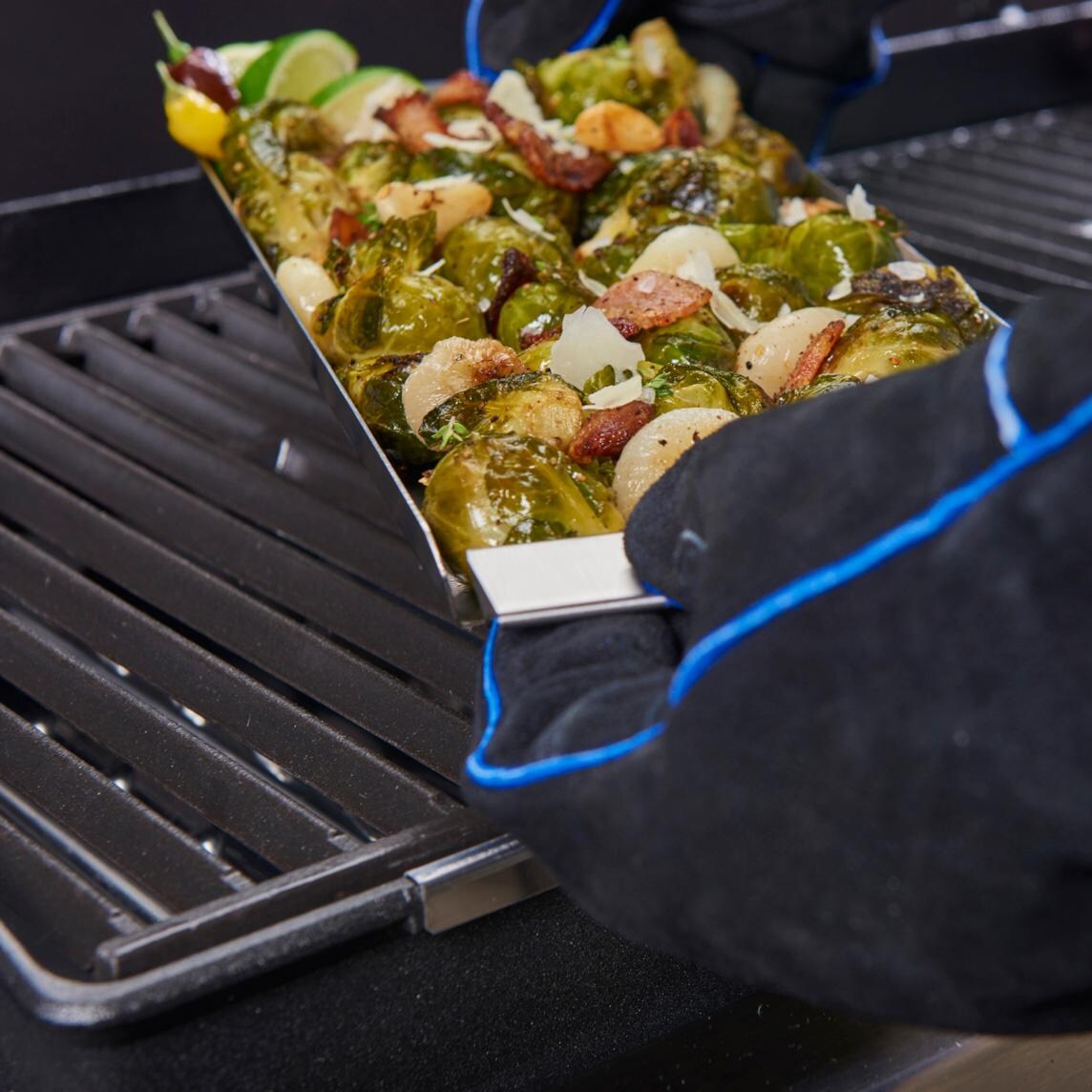 Broil King Stainless Steel Narrow Grill Topper - 69722 - Putting on Grill - Lifestyle thumbnail