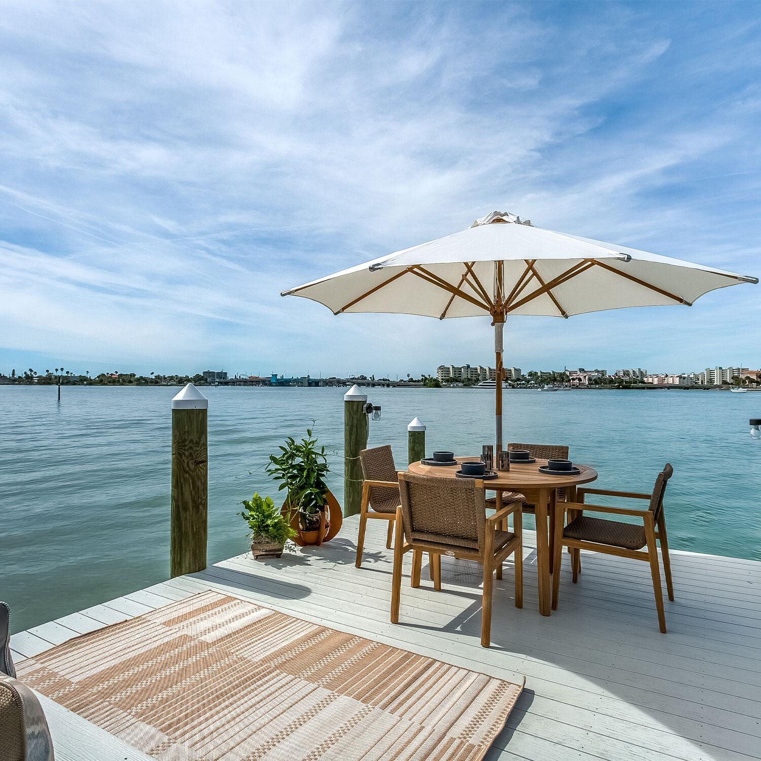 Admiral 6 Pc Dining Set w/ 50 Inch Round Table & Umbrella in Brown Sand by Royal Teak Collection - By The Pool - Lifestyle thumbnail