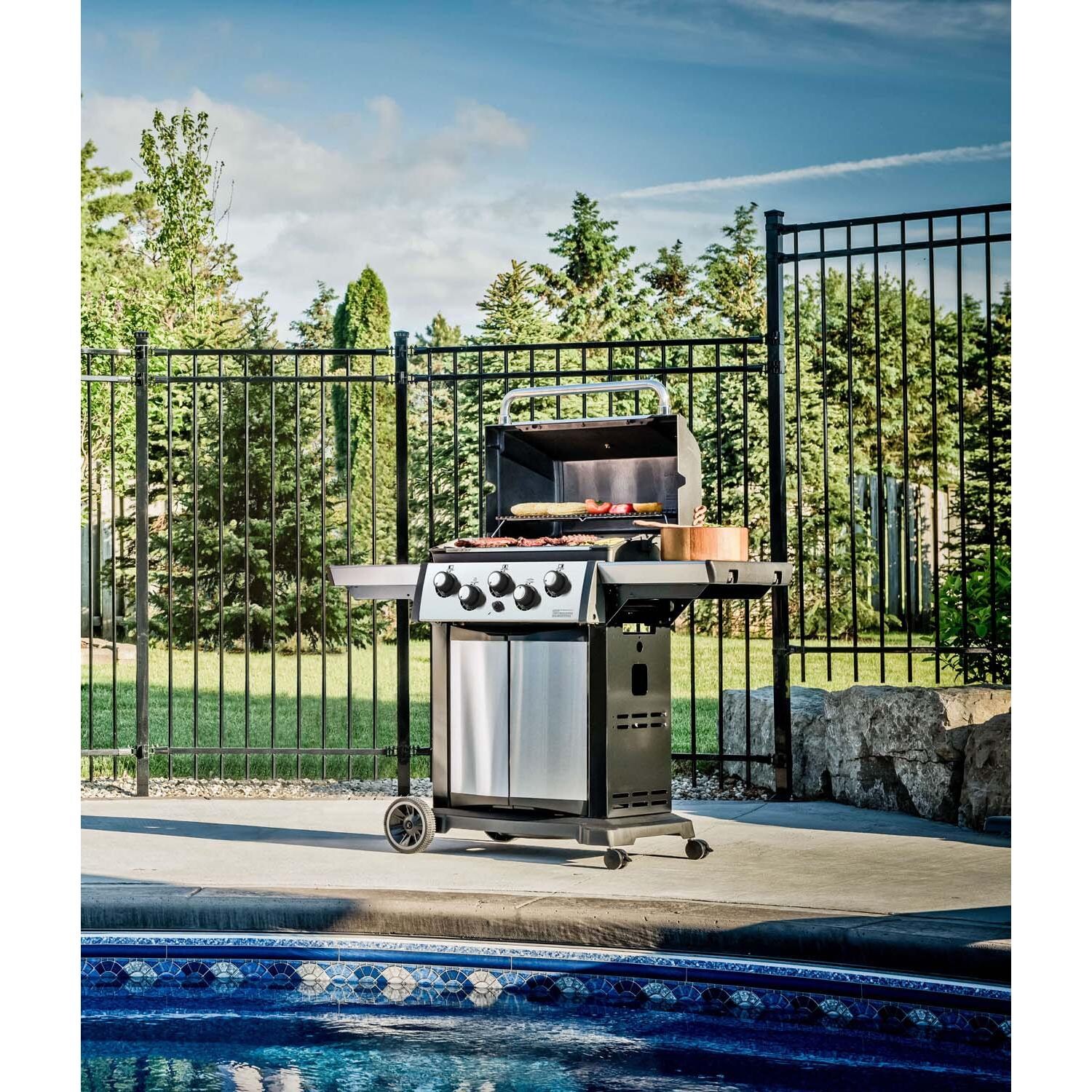 Broil King 946884 23 1/2 Inch Signet 390 Propane Gas Grill - By the Pool - Lifestyle thumbnail