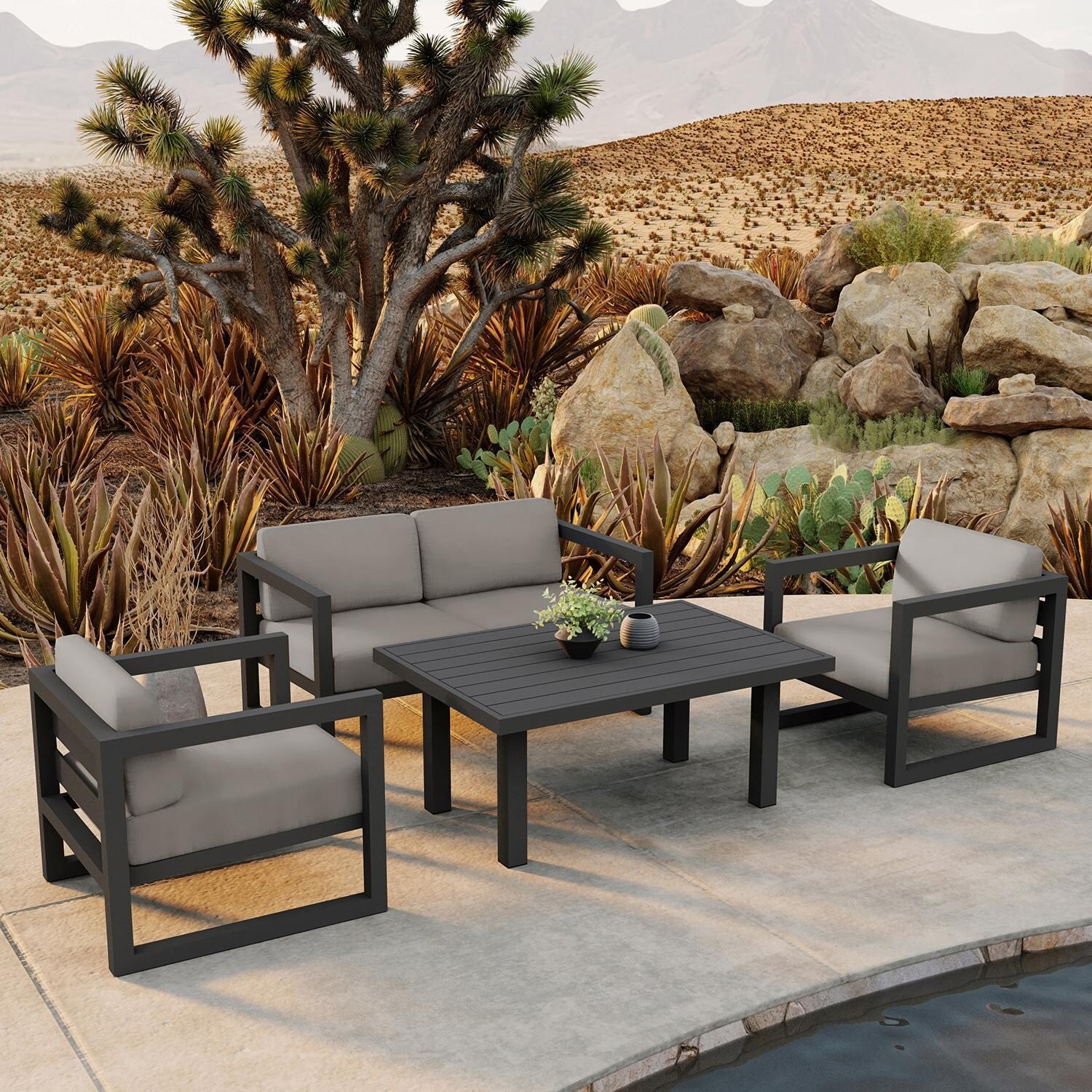 Misty Cove 4 Piece Seating Set in Slate w/Chat Table & Canvas Charcoal Cushions by Lakeview - Lifestyle thumbnail