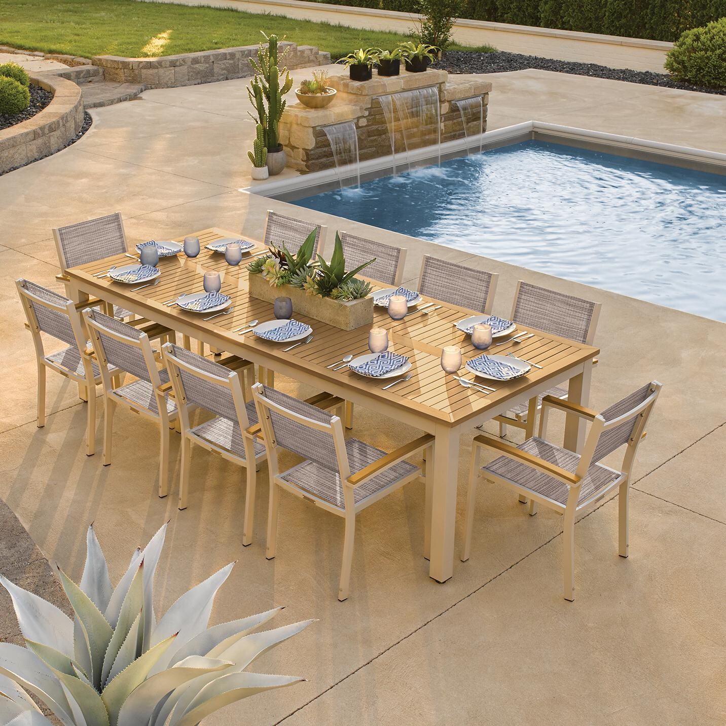 Travira 11 Piece Aluminum Patio Dining Set W/ 103 X 42 Inch Table and Tekwood Natural Tabletop By Oxford Garden - On The Patio thumbnail